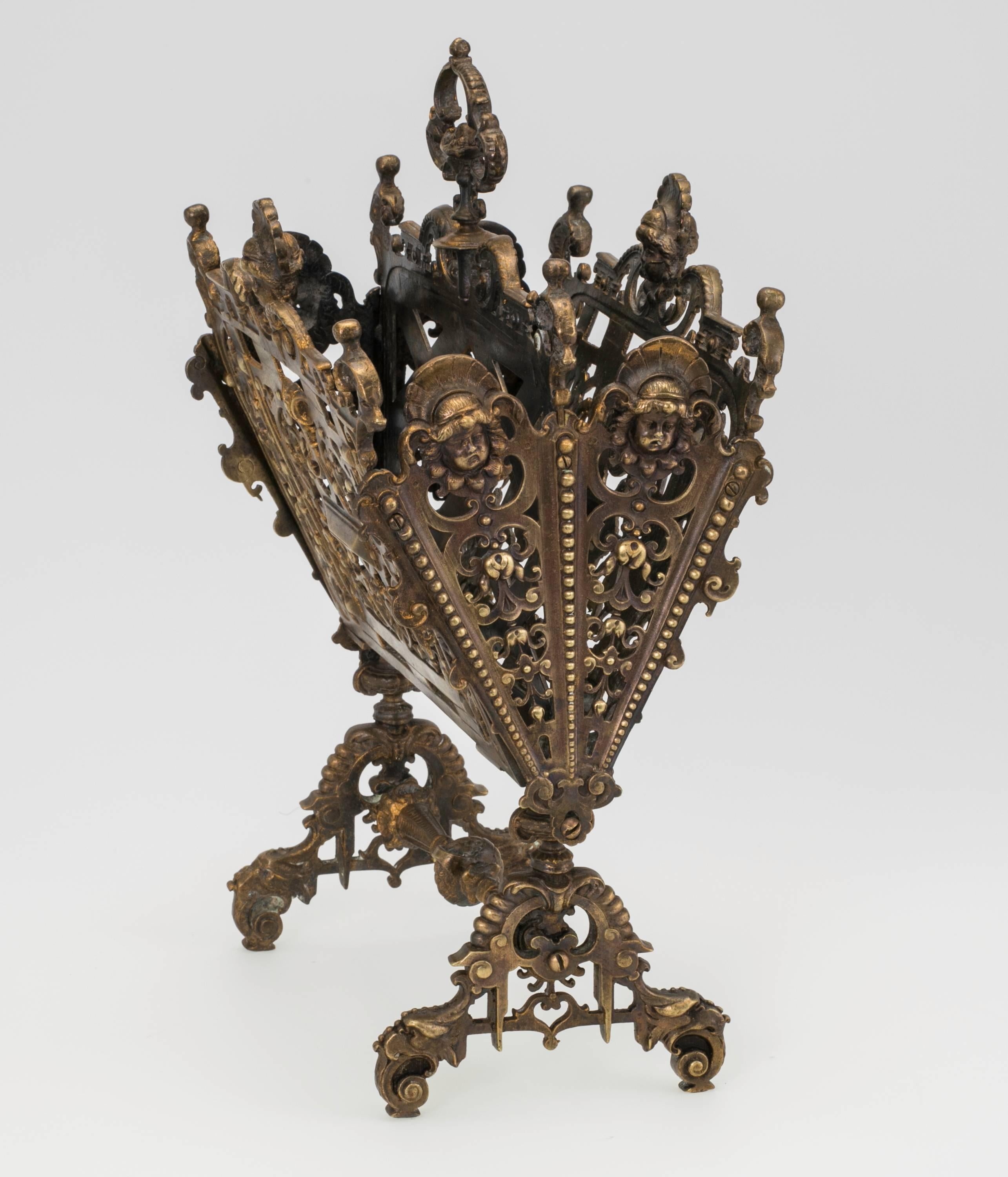 C.1890,  French gilt bronze letter holder. Superbly detailed,  cast bronze pierced work. Decorative theme in lovely female faces. Divided compartments with finial handle. Wonderful accent accessory for your desk.