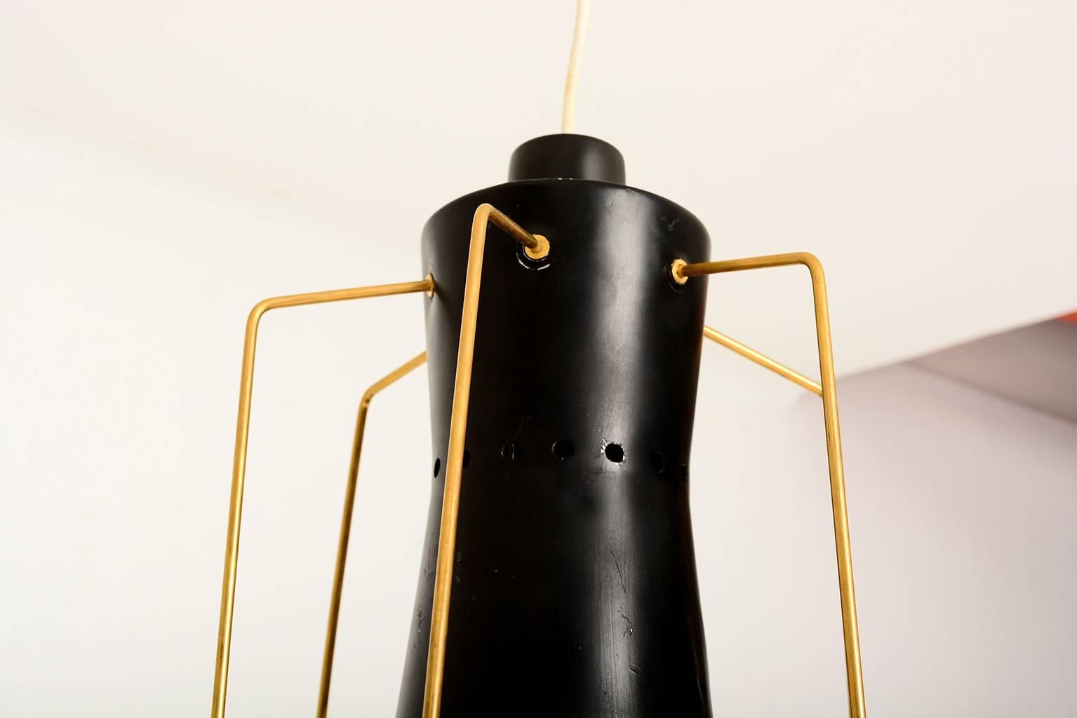 For your consideration a rare midcentury spider chandelier ebonized metal with plated legs.
Italy, circa 1950s.
 