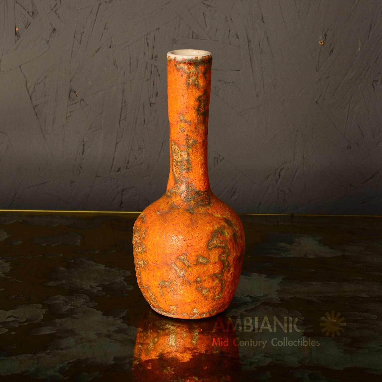 For your consideration a vintage ceramic pottery with long neck. 

Dominant color is orange with volcanic texture. 

7