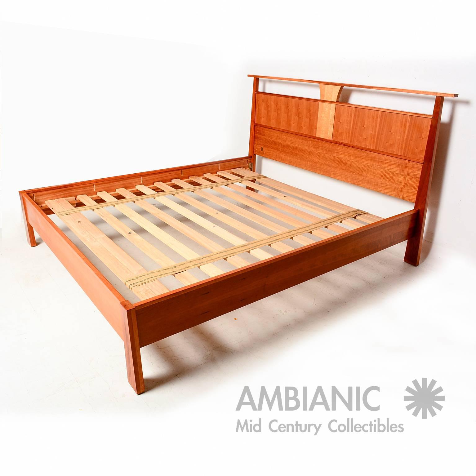 For your consideration a beautiful cal king bed produced by Wood Castle in Oregon.

Solid cherry and maple wood with fine details of construction. 
Please notice the tapered legs with clean modern lines. 

Will fit a Cal King mattress 72