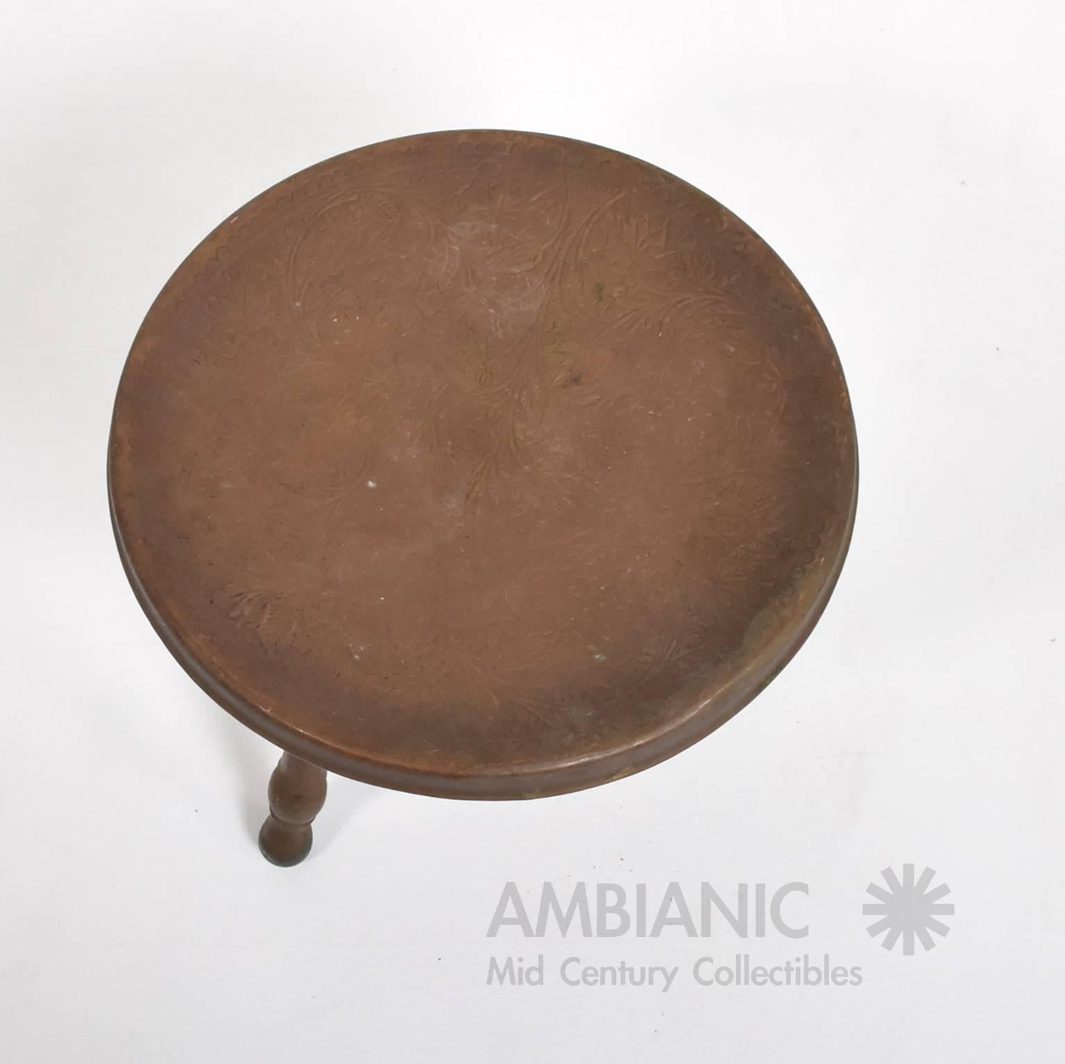 For you consideration a vintage tripod copper alloy stool.
Unmarked, no information on the maker.
Original unrestored condition. Original patina. Lower section of the legs have verdigris patina.
Legs can be removed for safe and easy