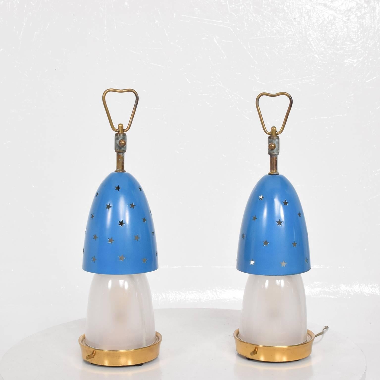 For your consideration a pair of table lamps by Angelo Lelli for Arredoluce, Italy, circa 1950s.

Brass body with aluminum shades painted in blue. Original opaline glass shade. Brass has the original vintage patina. 

Dimensions: 13 1/2