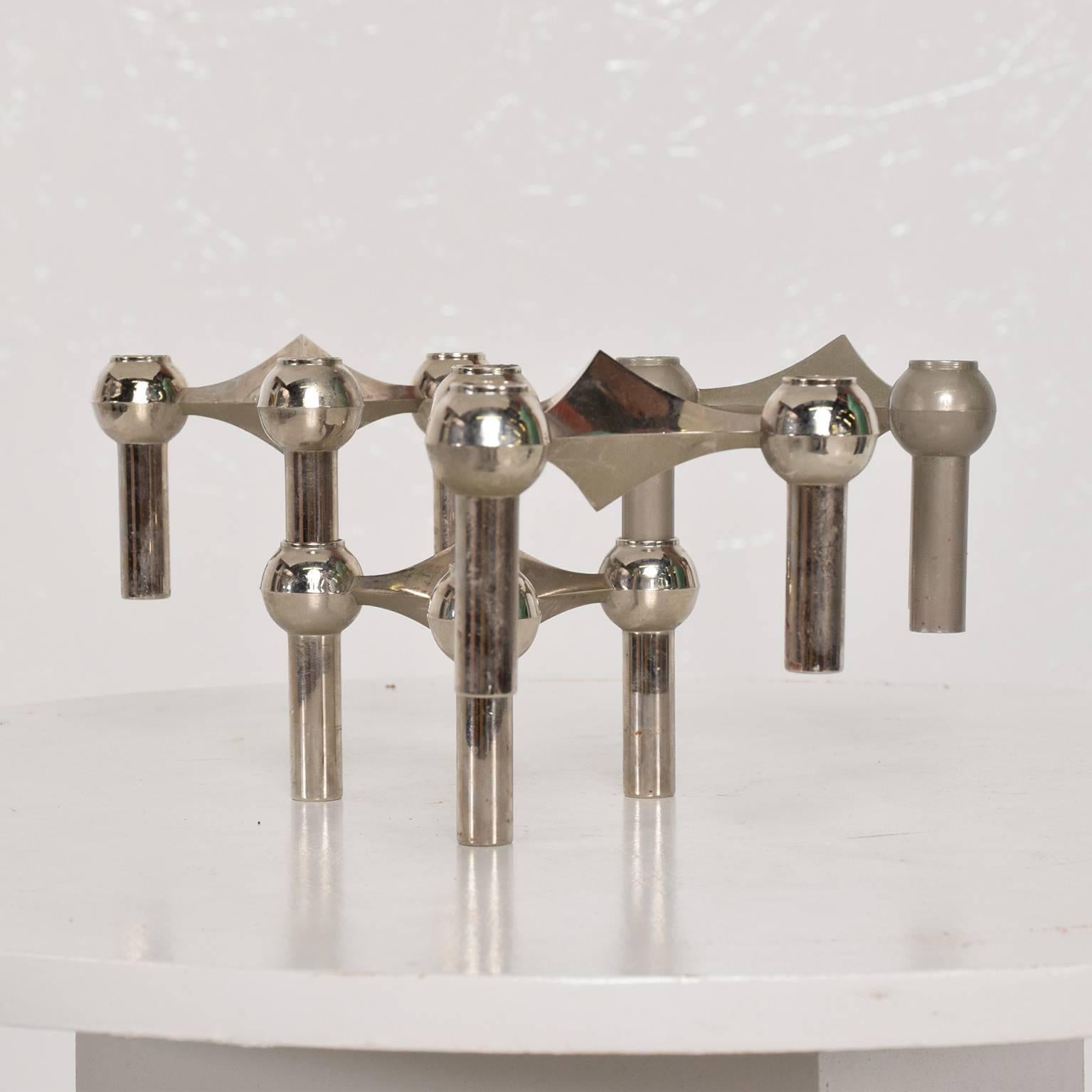 We are pleased to offer for your consideration a set of four candleholders by Nagel and Stoffi .

Dimensions: 2 3/8" H x 4" in diameter.

   