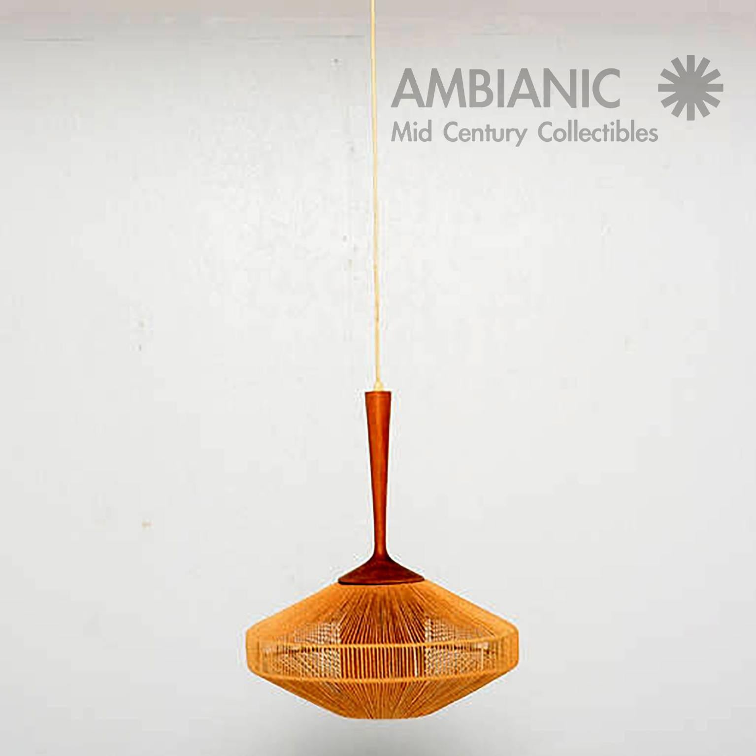For you consideration a vintage hanging fixture. Teak and hanging rope chandelier by Fog & Morup. 

Original vintage condition.