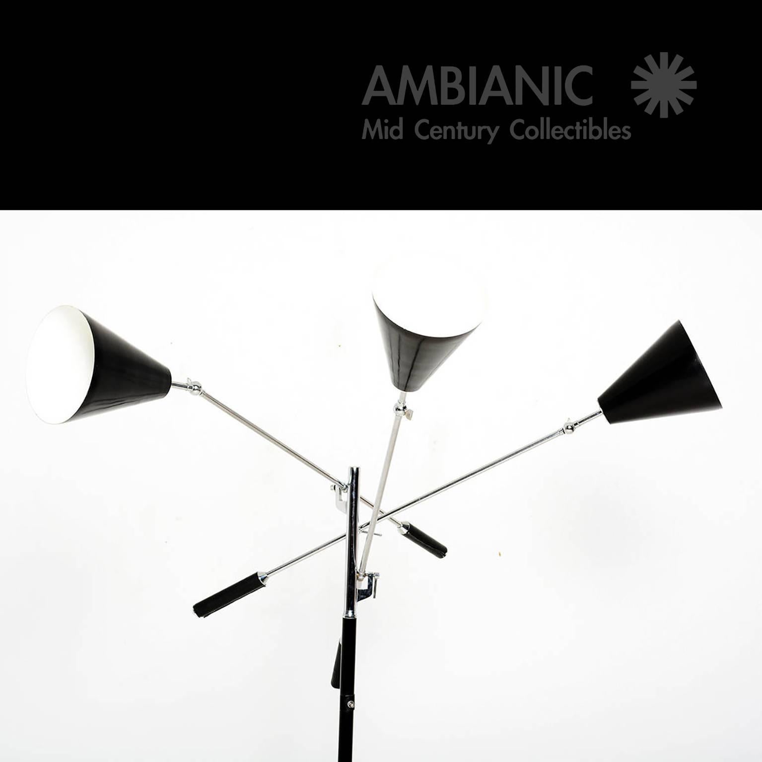 For your consideration a Triennale floor lamp in the style of Arredoluce. 
Black shades with chrome arms and marble base.

Lamp stamped 