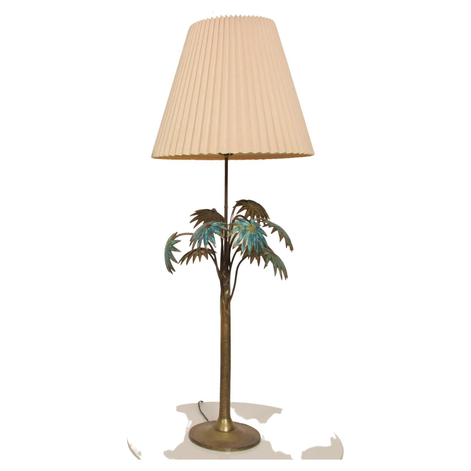 Exquisite Pepe Mendoza Palm Tree Tall Table Lamp
Made in MEXICO circa 1950s
Bronze and malachite.
Unmarked.
33.5 H (base of socket), 16 in diameter (overall), base 8 in diameter
Original Unrestored Vintage Preowned Condition. New socket.
Refer to