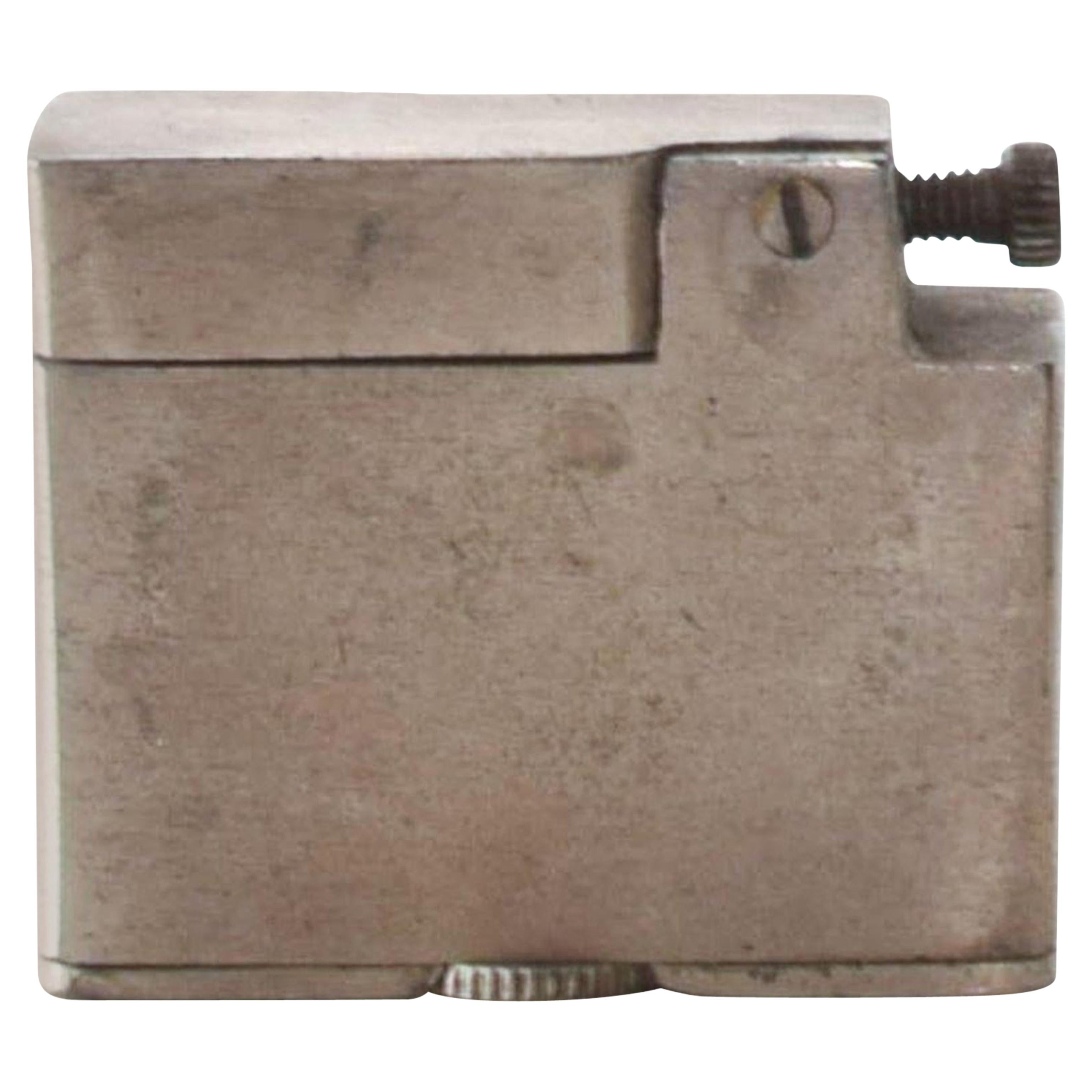 AMBIANIC presents
Silver plated Cigarette Lighter Vintage Midcentury Mod 1960s
Dimensions: 1.5 x .5 x 1.25
Original unrestored vintage preowned condition. Item has not been serviced. 
Refer to images provided.

