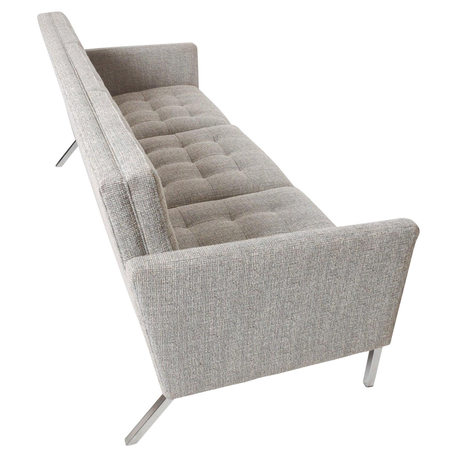 Sofa by Steelcase in the style of Florence Knoll, circa 1950s
Classic Sofa tuxedo button tufted three-seater design.
Chrome base with rear angled legs.
No label remains.
Measures: 76 W x 31.5 D x 31