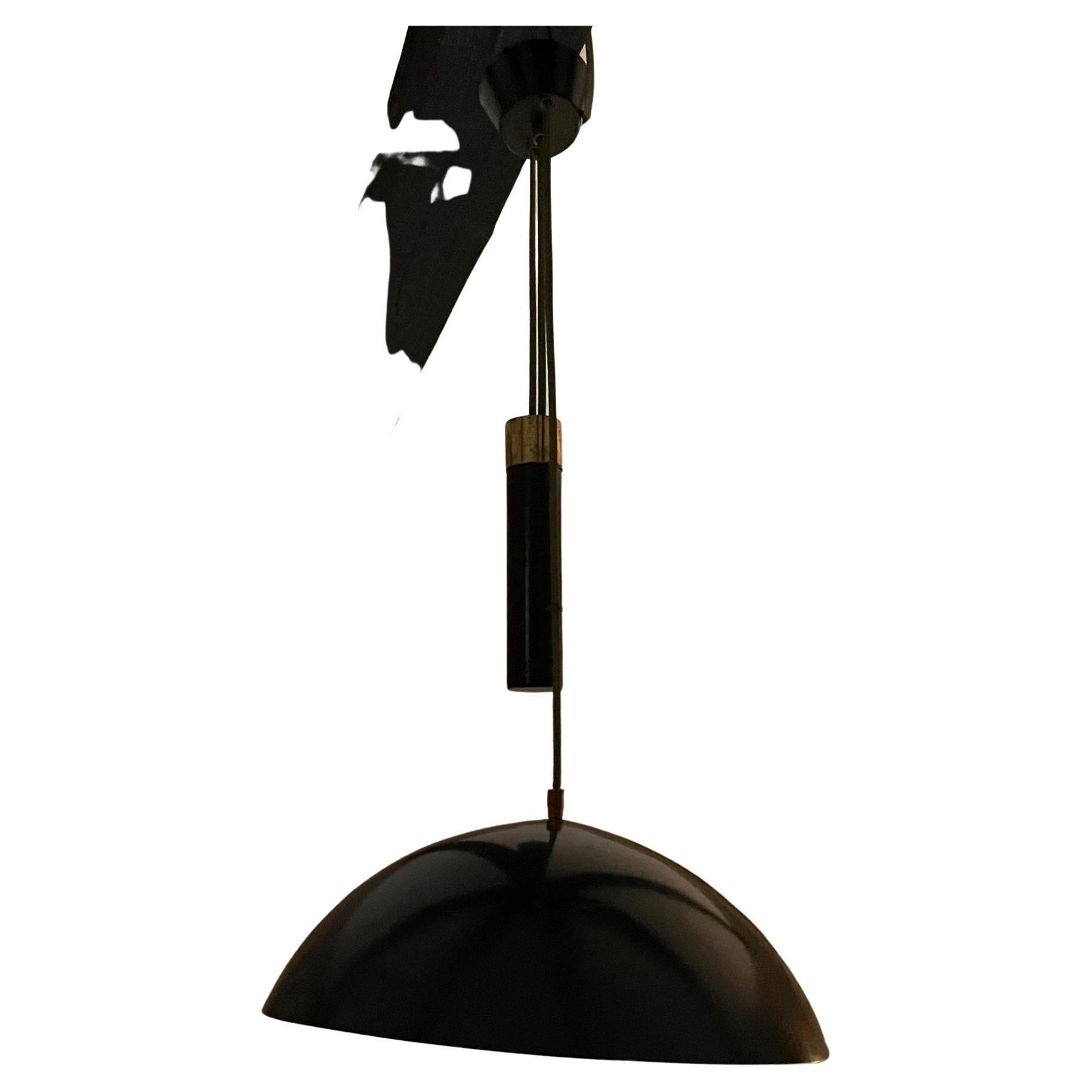 AMBIANIC presents
Stilux Milano Lamp Pendant Light Italy 1950s
adjustable slider
Oversize spun aluminum shade black satin finish.
Brass pull down handle.
Stamped from the maker.
32 tall with adjustable shade 15 diameter x 9 tall
Original vintage