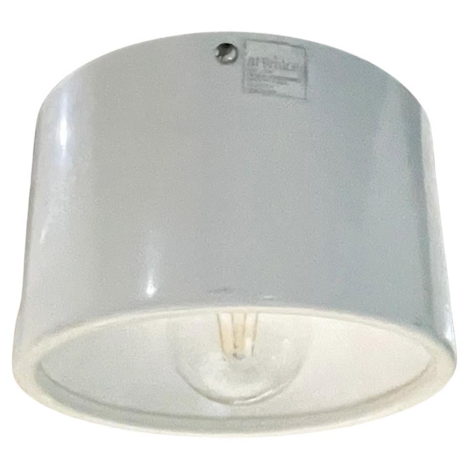 Ceiling lamp
Arteluce white ceiling semi flush mount lamp Italy 1950s
Maker stamp present. Attributed to the design of Gino Sarfatti.
Measures: 5.75 height x 9 diameter inches
Original unrestored vintage condition and presentation.
Refer to
