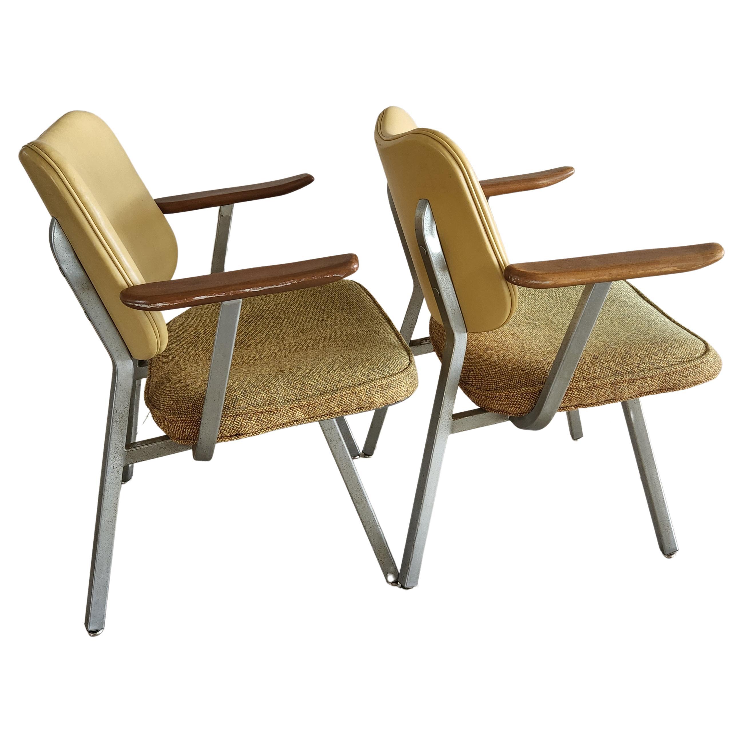 Streamline Modern Industrial Armchairs Vinyl & Tweed
Metal frame steel and aluminum Walnut Wood arms.
Made by Royal Metal. 
Design style of Alfons Bach and Donald Deskey for Royal Metal
Scooped backs and square tubular steel make for outstanding