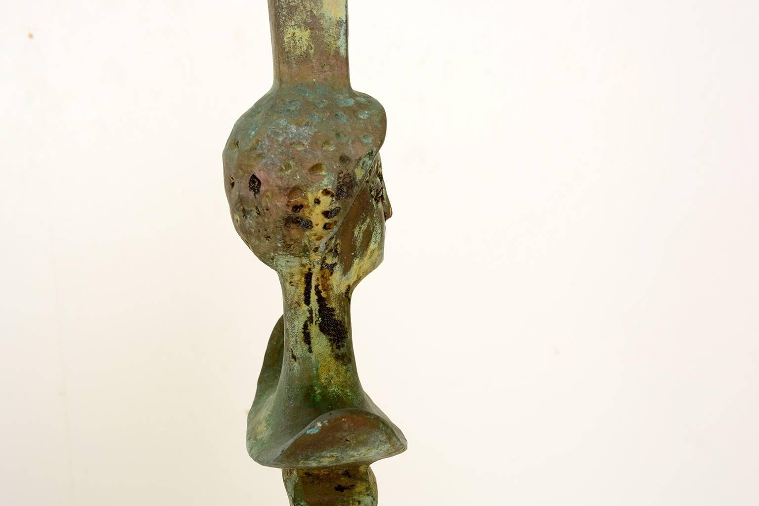 For your consideration a floor lamp in cast bronze in the style of Giacometti.

Amazing vedigris patina. 

Unmarked, no markings from the maker.
