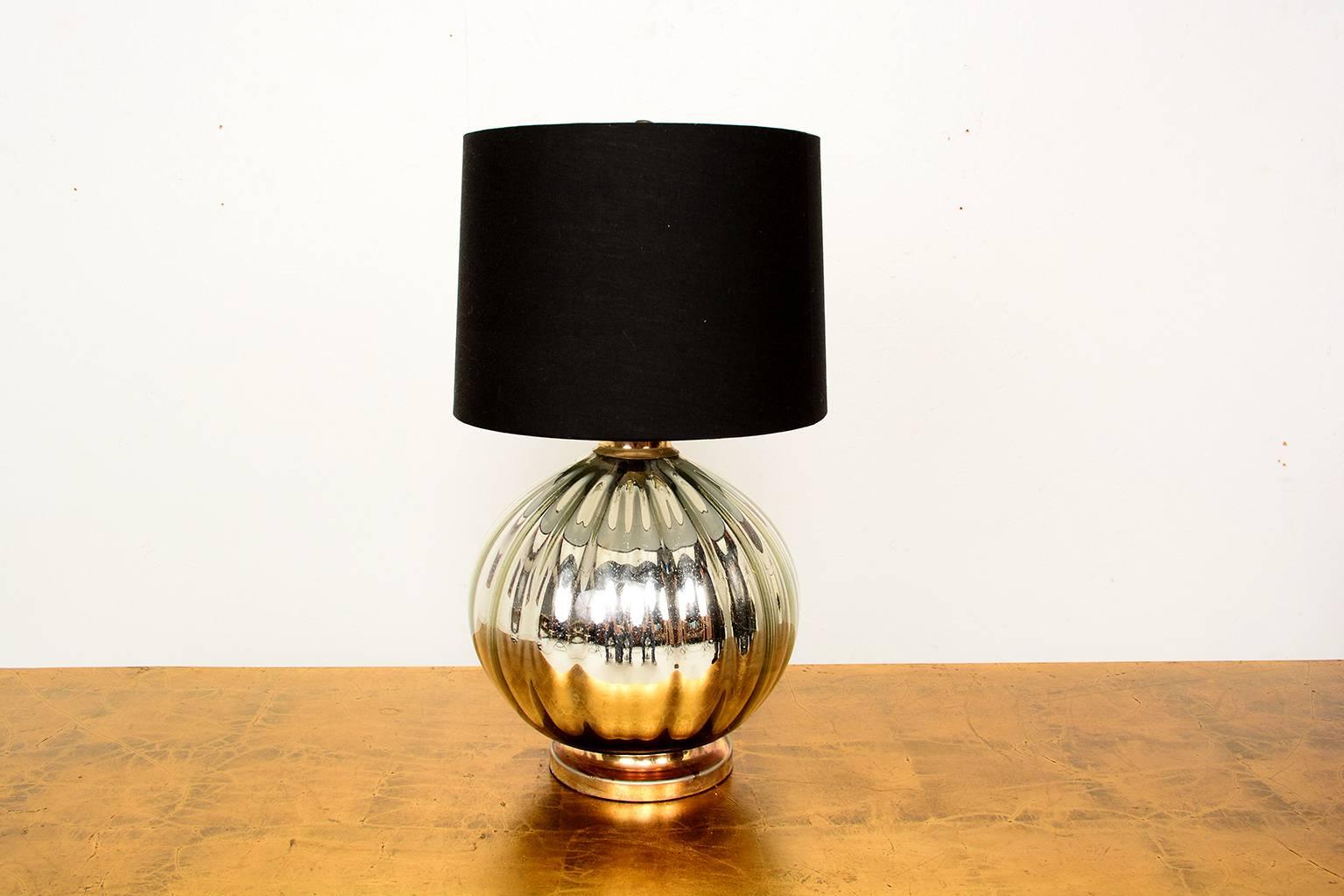 For your consideration a mercury table lamp, mounted in a metal base. 
The lamp has been rewired. 

Black shade is not included in the sale, for props only, however we can source one for an additional fee. 

Mexico, circa 1950s, Unmarked.