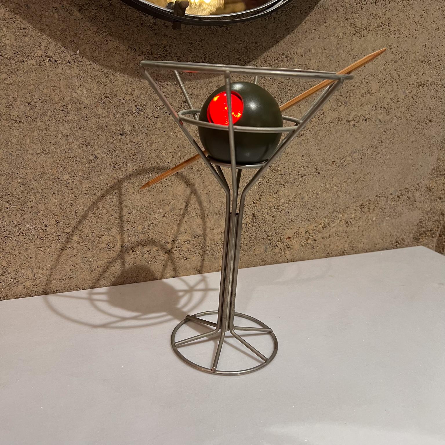 martini glass table with olive