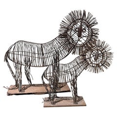 Mid-Century Patinated Iron Lion Sculptures by Curtis Jeré, USA