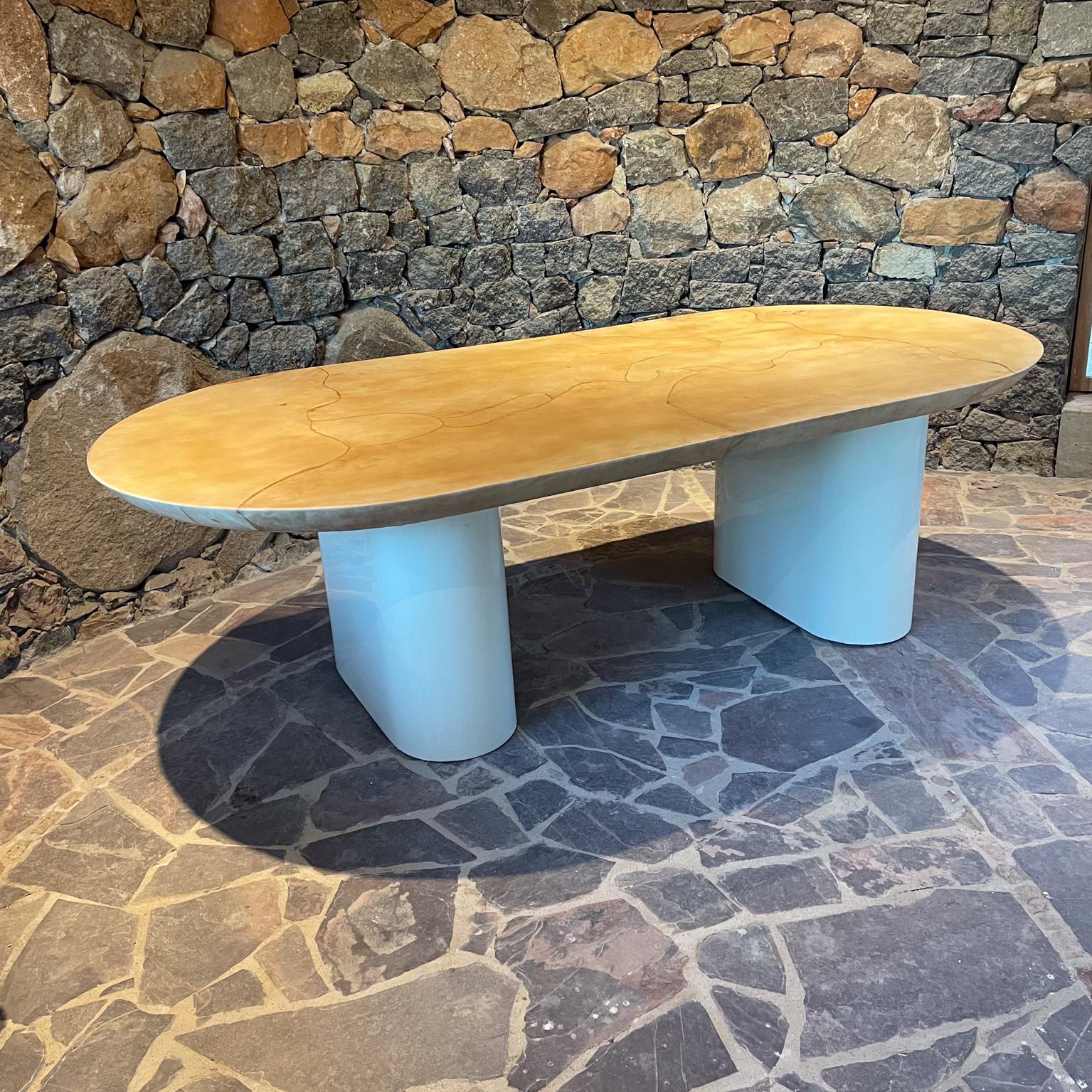 For your consideration, a Karl Springer Ltd 1980 cream lacquered goatskin knife edge dining table.  Restored.  USA circa the 1980s.
Dramatic double pedestal base.
Dimensions: 28.75 H 47.25 D x 94.5 L inches
Maker label present. 

Please refer to