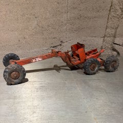 vintage 1940s–1950s Structo pressed steel orange road grader toy