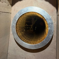 Miroir mural rond « Infinity » avec cadre texturé à finition argentée