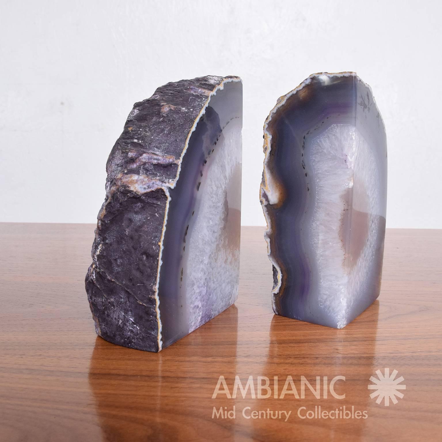 For your consideration a pair of bookends made of amethyst.

Retains stamp 