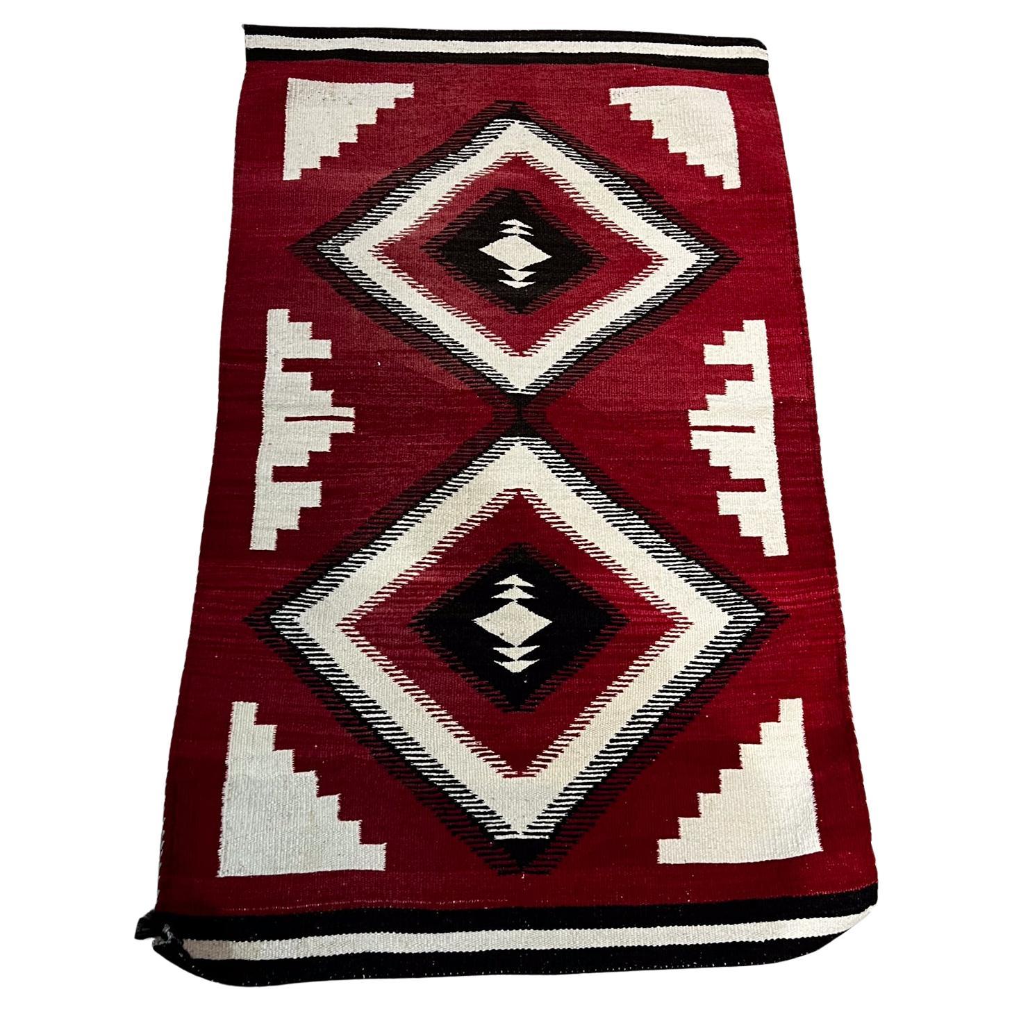 
Wall Decor Navajo Indian Style Large Vintage Rug Tapestry Wall Hanging
46.5L x 28 W 
Preowned vintage unrestored condition.
Review images please.