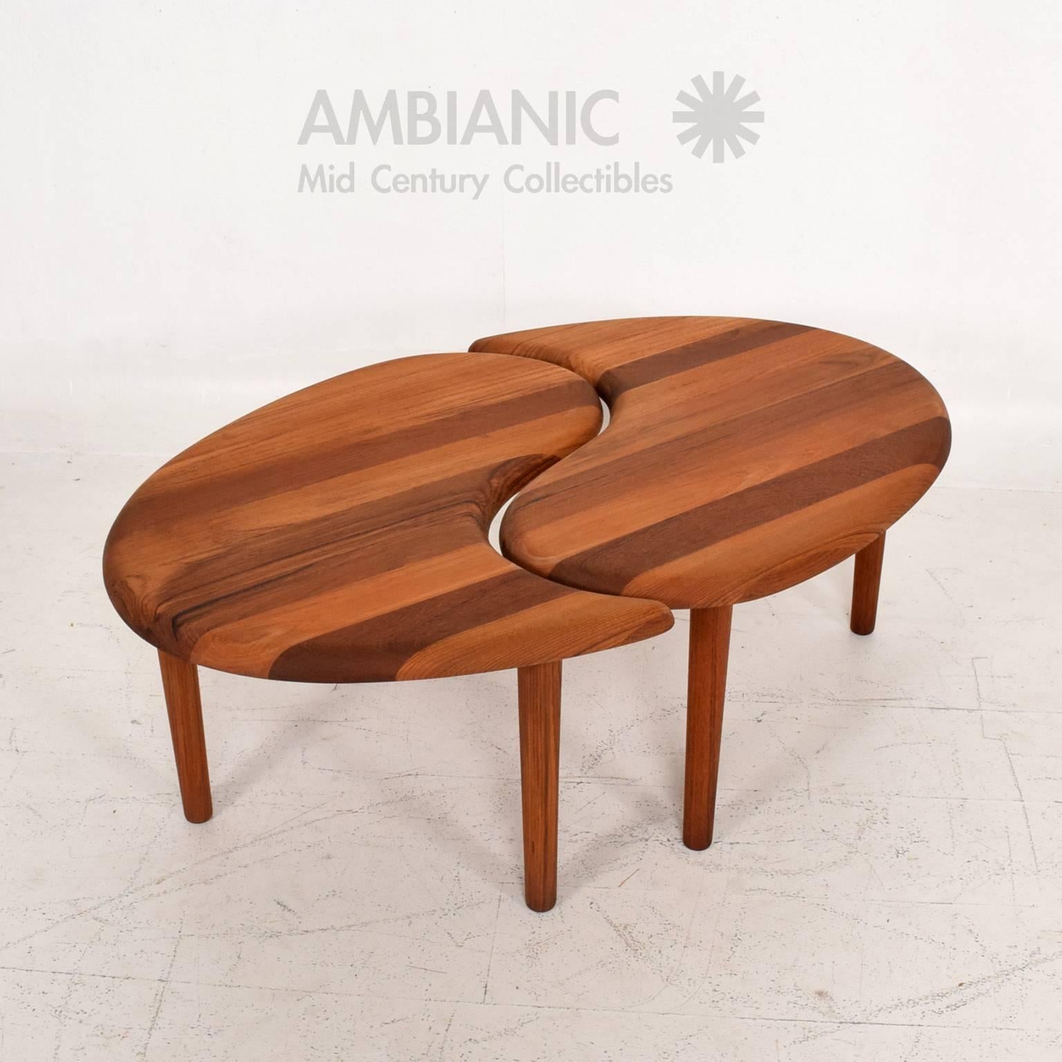 For your consideration a pair of side table or coffee table constructed with solid teak wood. Peg legs can be removed for safe and easy shipping. 

Attributed to Prelude Hi Ace. No label present. 

44