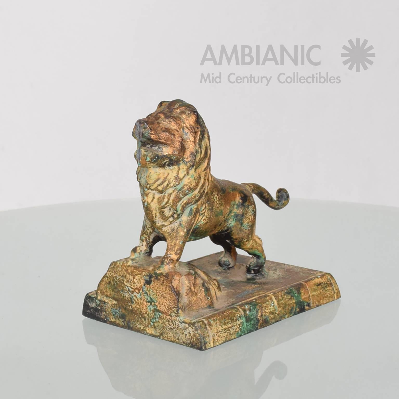 Hollywood Regency Cast Iron Lion Bookends with Faux Bronze Patina In Good Condition In Chula Vista, CA