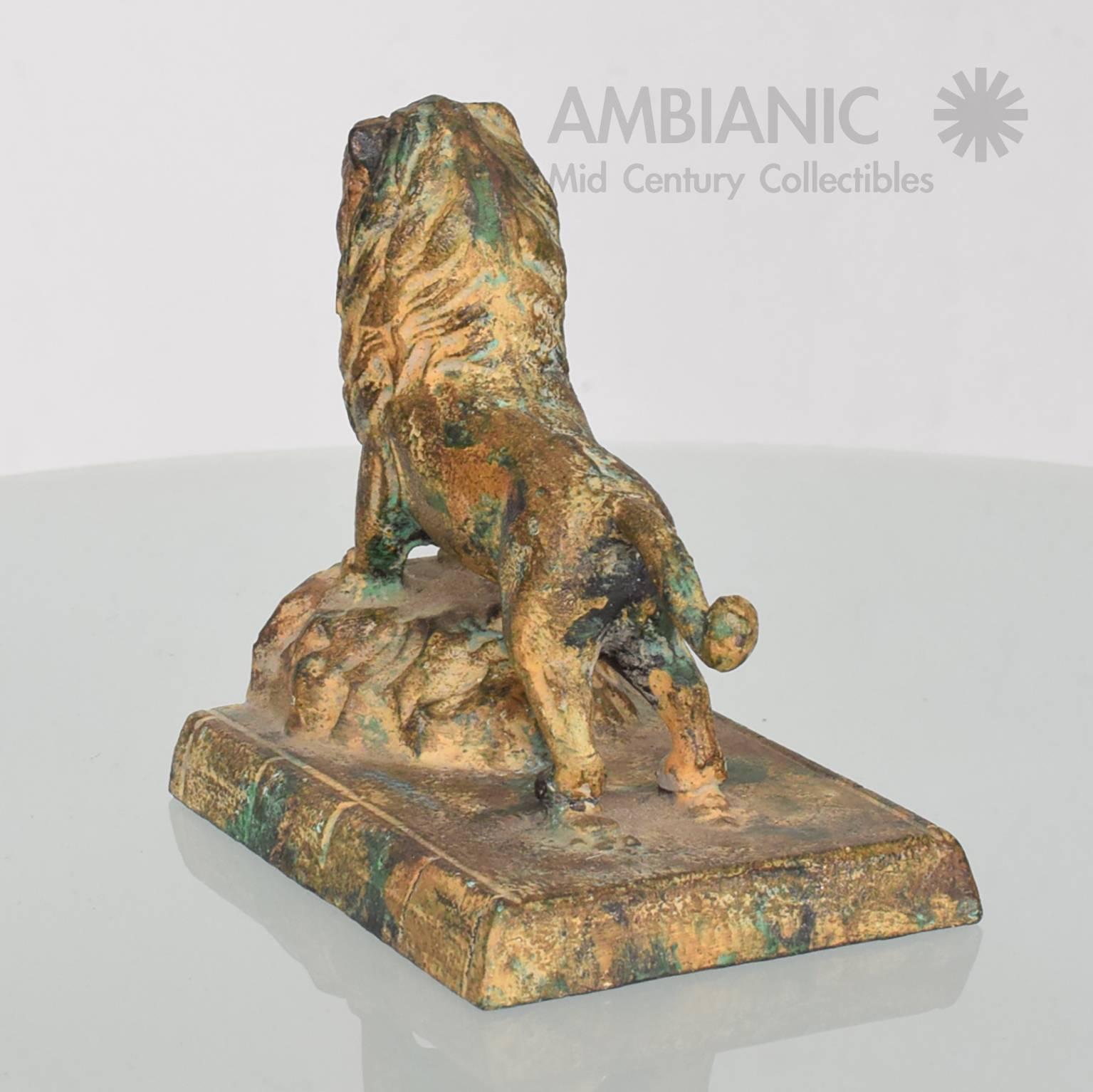 Hollywood Regency Cast Iron Lion Bookends with Faux Bronze Patina 1