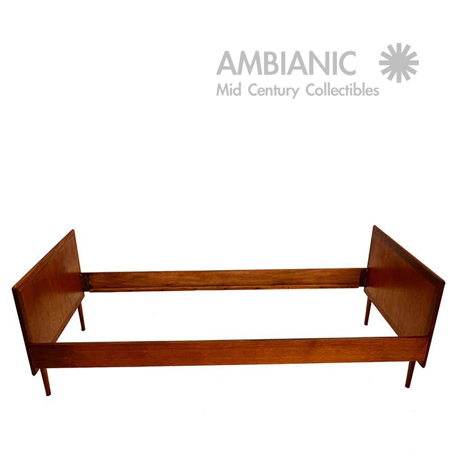 For your consideration a Danish modern single bed that can be used as a daybed. The headboard and footboard are finished on both sides and have the same dimensions. 

It can be taken apart for sage and easy shipping. Firm and sturdy. 
Wood slats