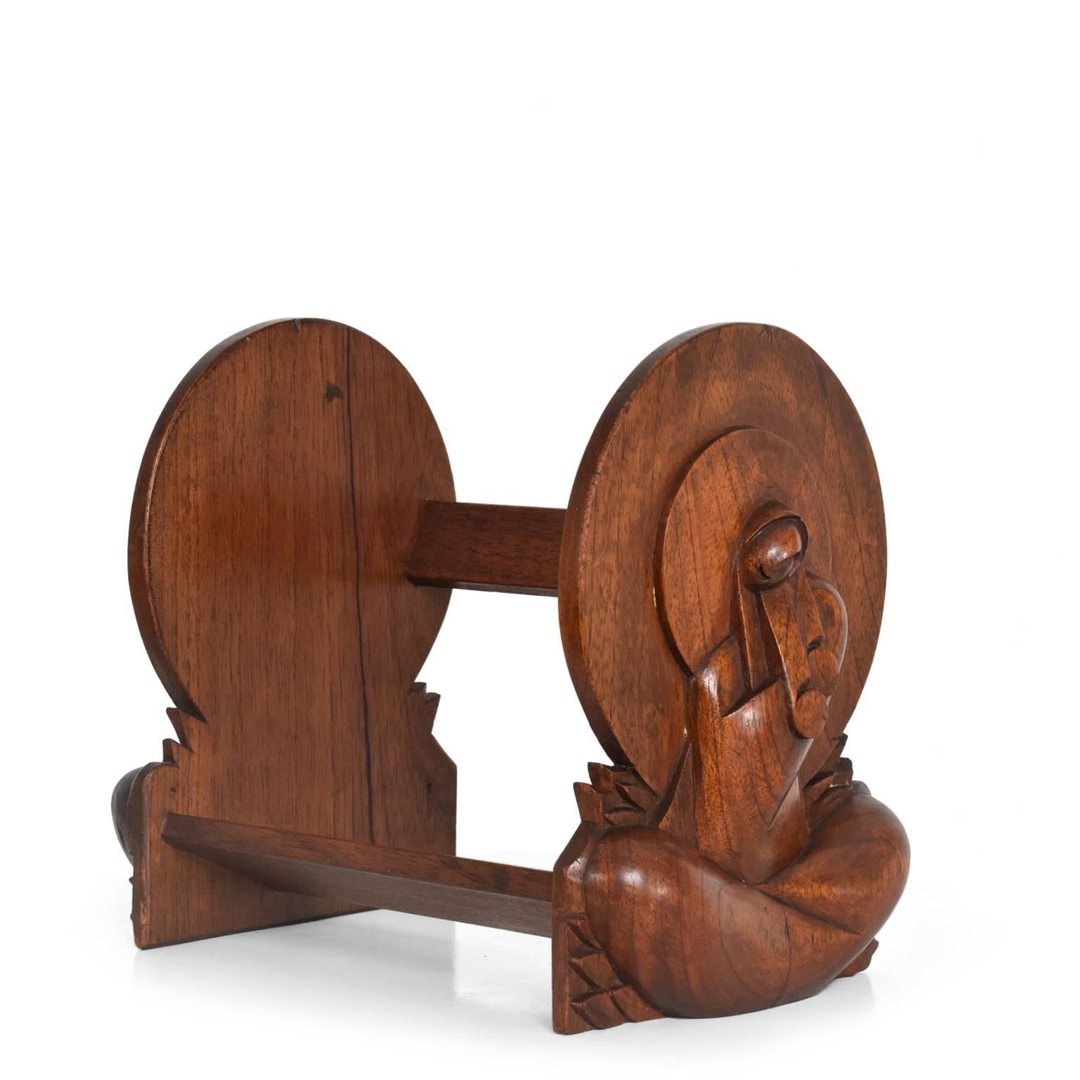 For your consideration a pair of bookends in solid mahogany wood with Art Deco decorations.

Dimensions: 9 1//4