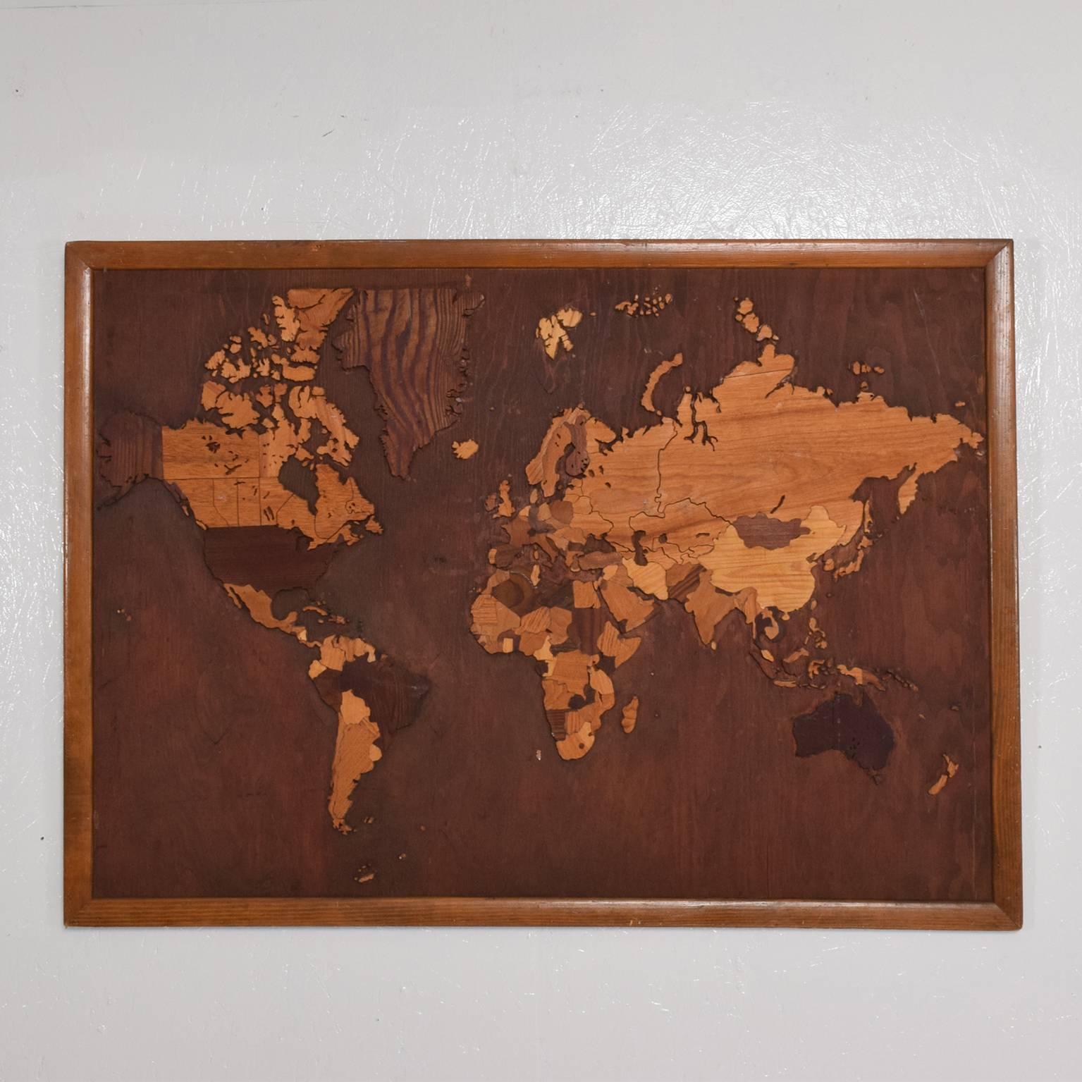 For your consideration a vintage custom work map constructed with several woods. 
Framed and mounted in a vintage plywood.

Unmarked. USA, circa late 1950s. Beautiful patina. 
Dimensions: 39 3/4" tall x 48 1/4" W x 3/4" thick.