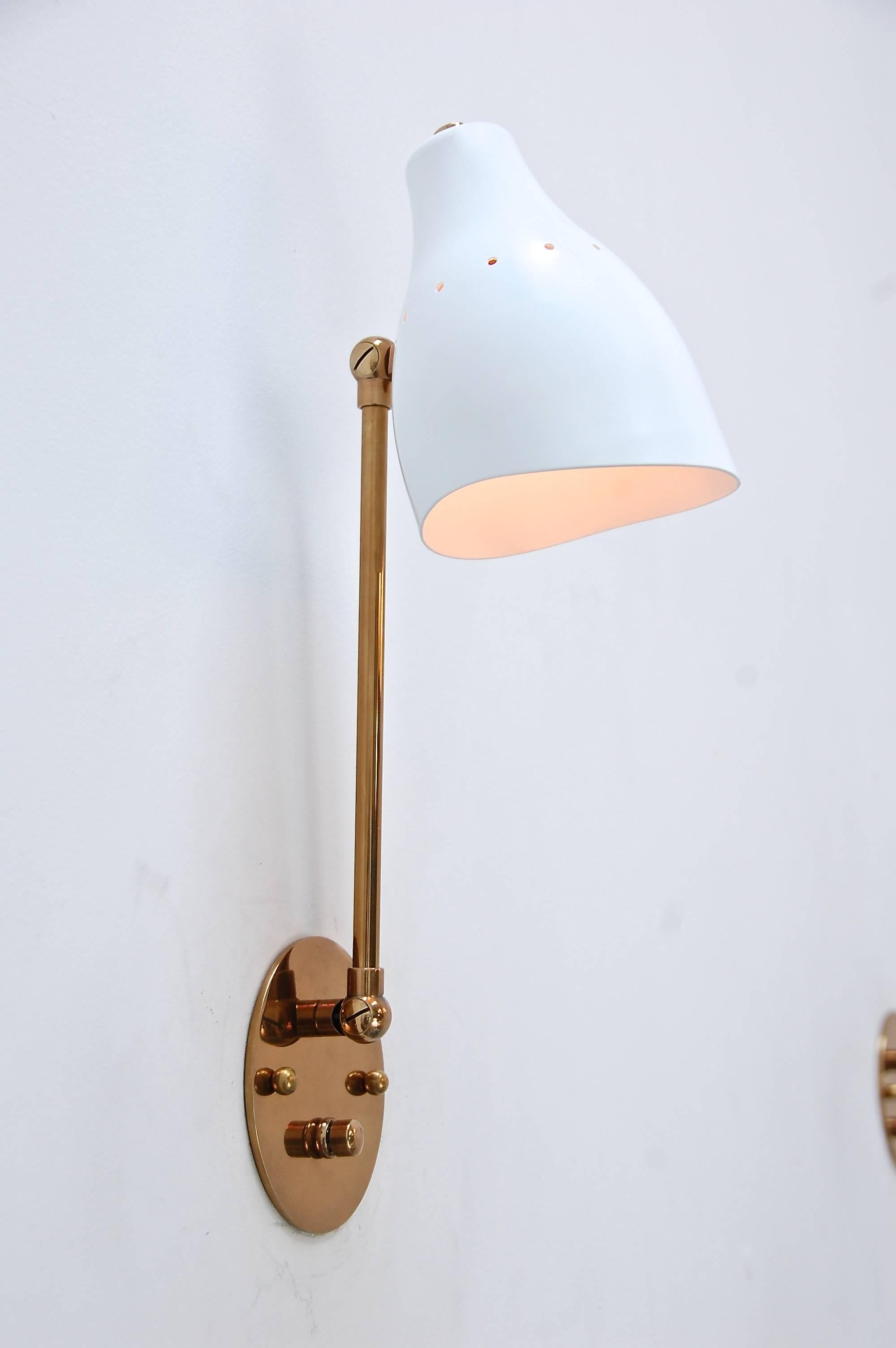 A foldable version of our original LUread sconces with a foldable articulated arm to allow for more variance in light direction. Made from solid brass and a hand-painted aluminum shade. Custom colors and dimensions available upon request. Single E12