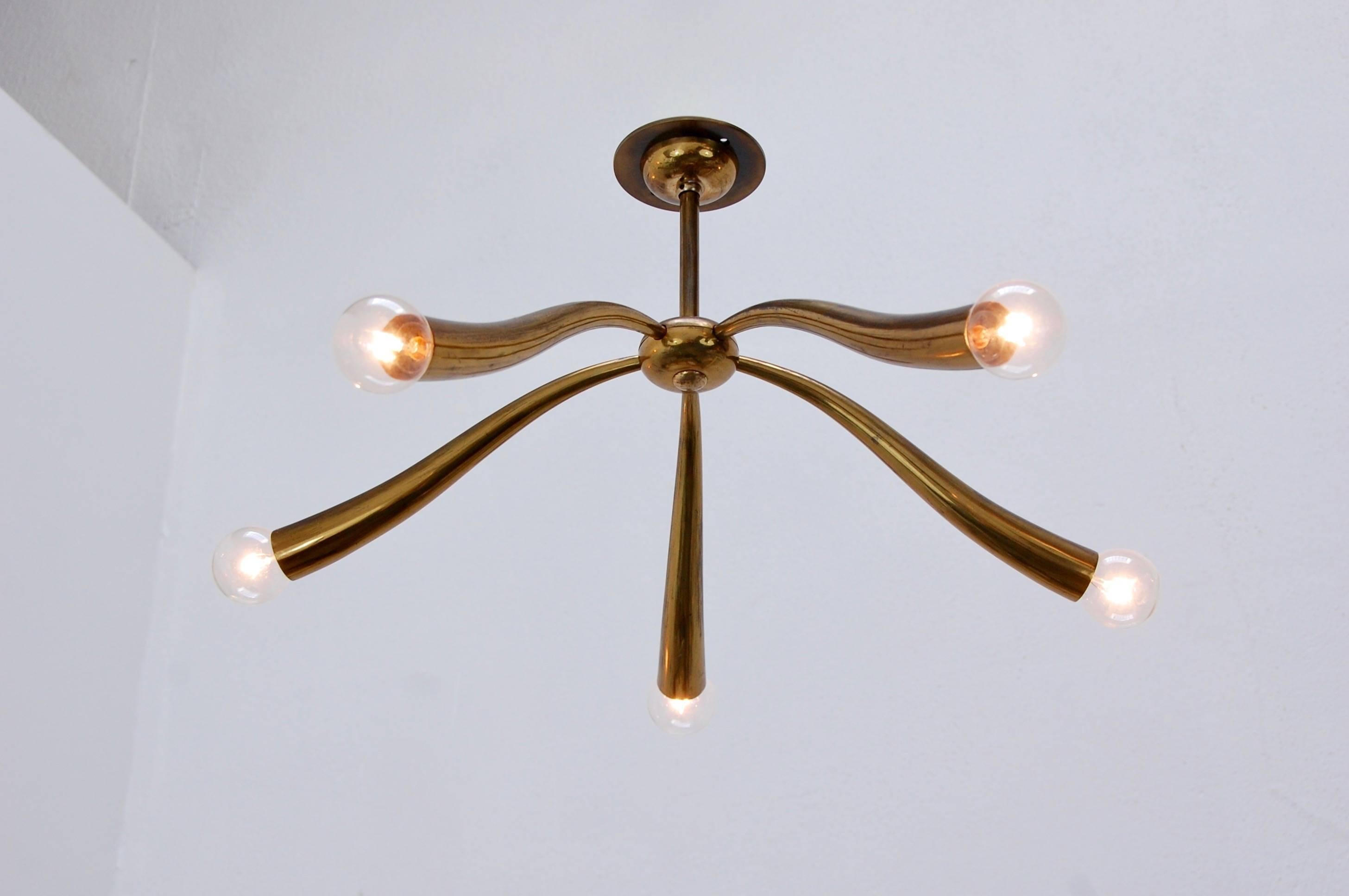 Of the period five-light Guglielmo Ulrich ceiling fixture from Italy. Partially restored, original brass finish, E12 candelabra based sockets, wired for the US. 

Measurements:
Overall drop 12”
Fixture height 7”
Diameter 23.

We at Lumfardo