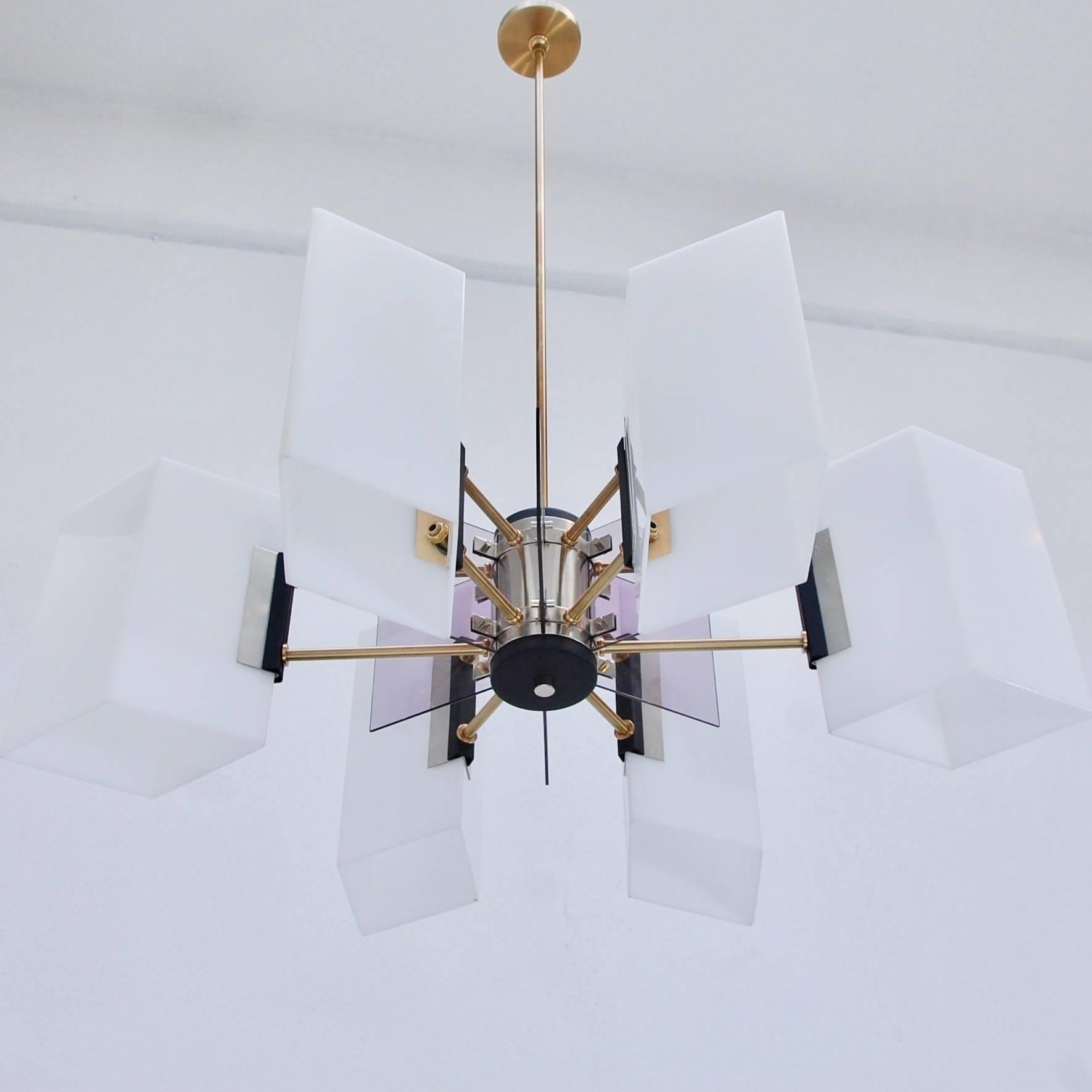 Stunning large geometric Stilux chandelier from 1950s, Italy. Single medium based socket per Lucite shade. Patinated brass and steel materials. 
Measures: Length 33”
Width 23”
Fixture height 10”
OAD: 39”.
 