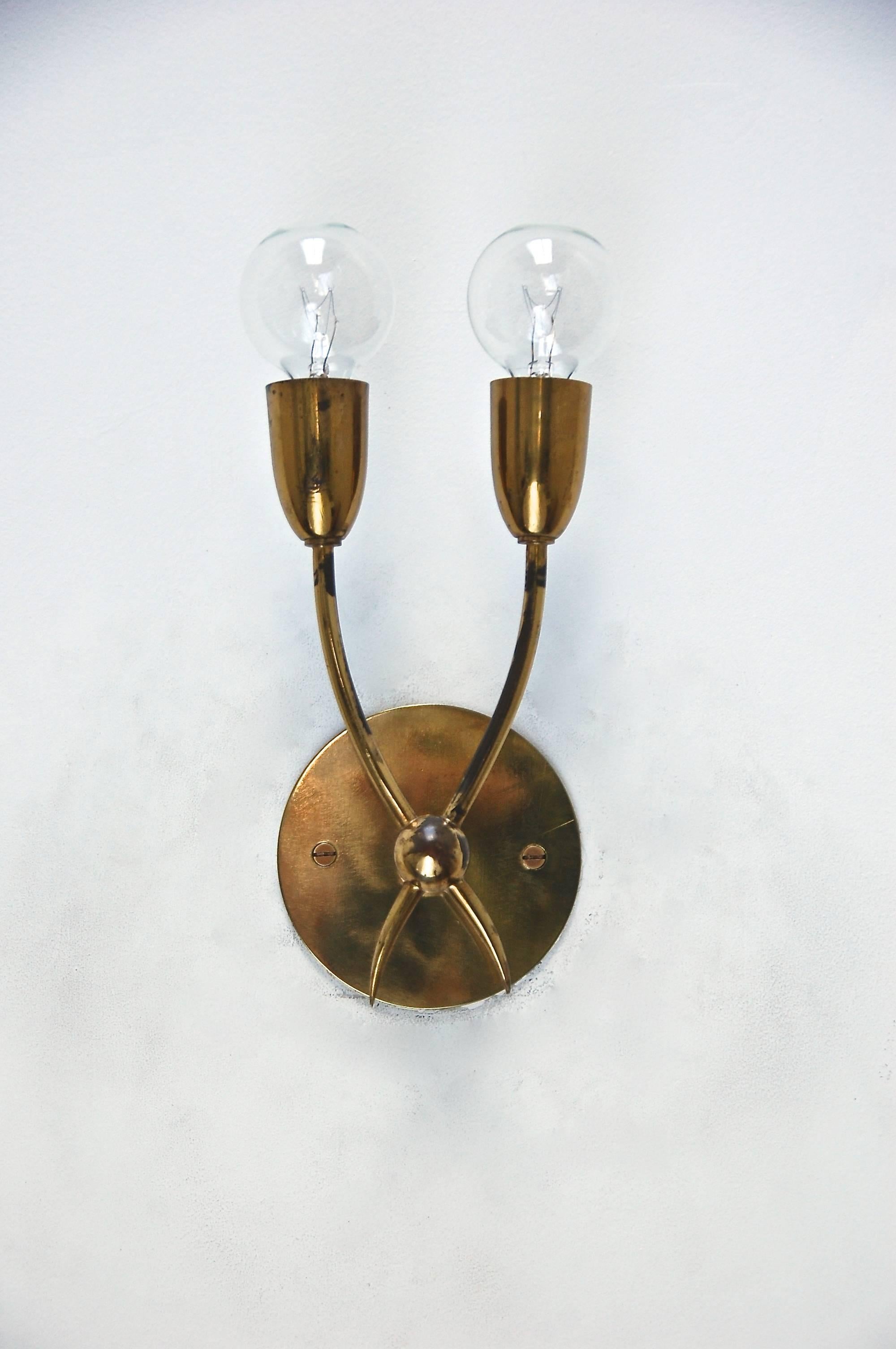 Charming pair of petite Italian sconces in the style of Guglielmo Ulrich in their original finish.

Dimensions listed include light bulbs shown.