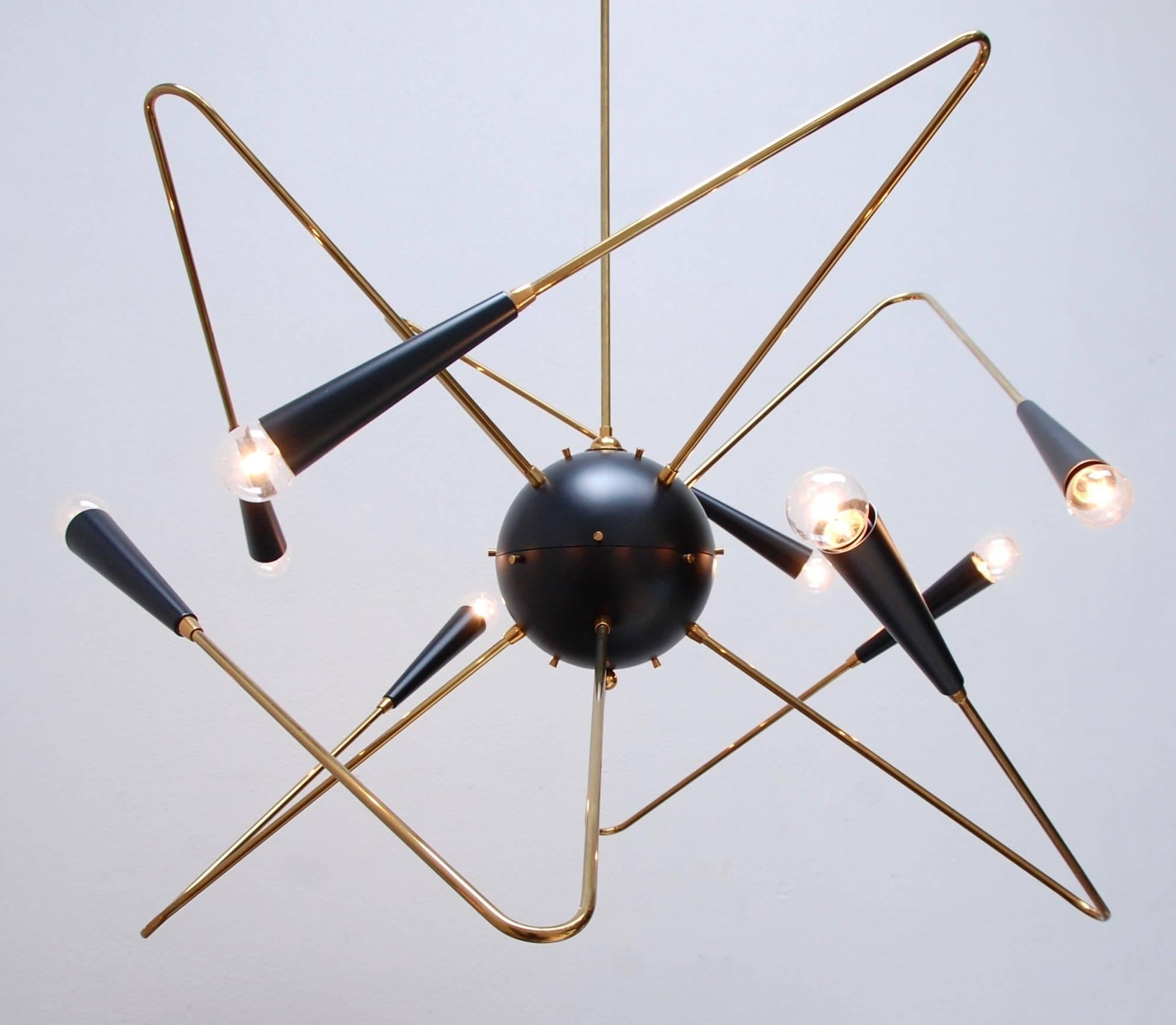 Atomic Sputnik chandelier in the spirit of Mid-Century Modern design. 
Fixture height 28”.
diameter 38”. 
current drop 54”.
 