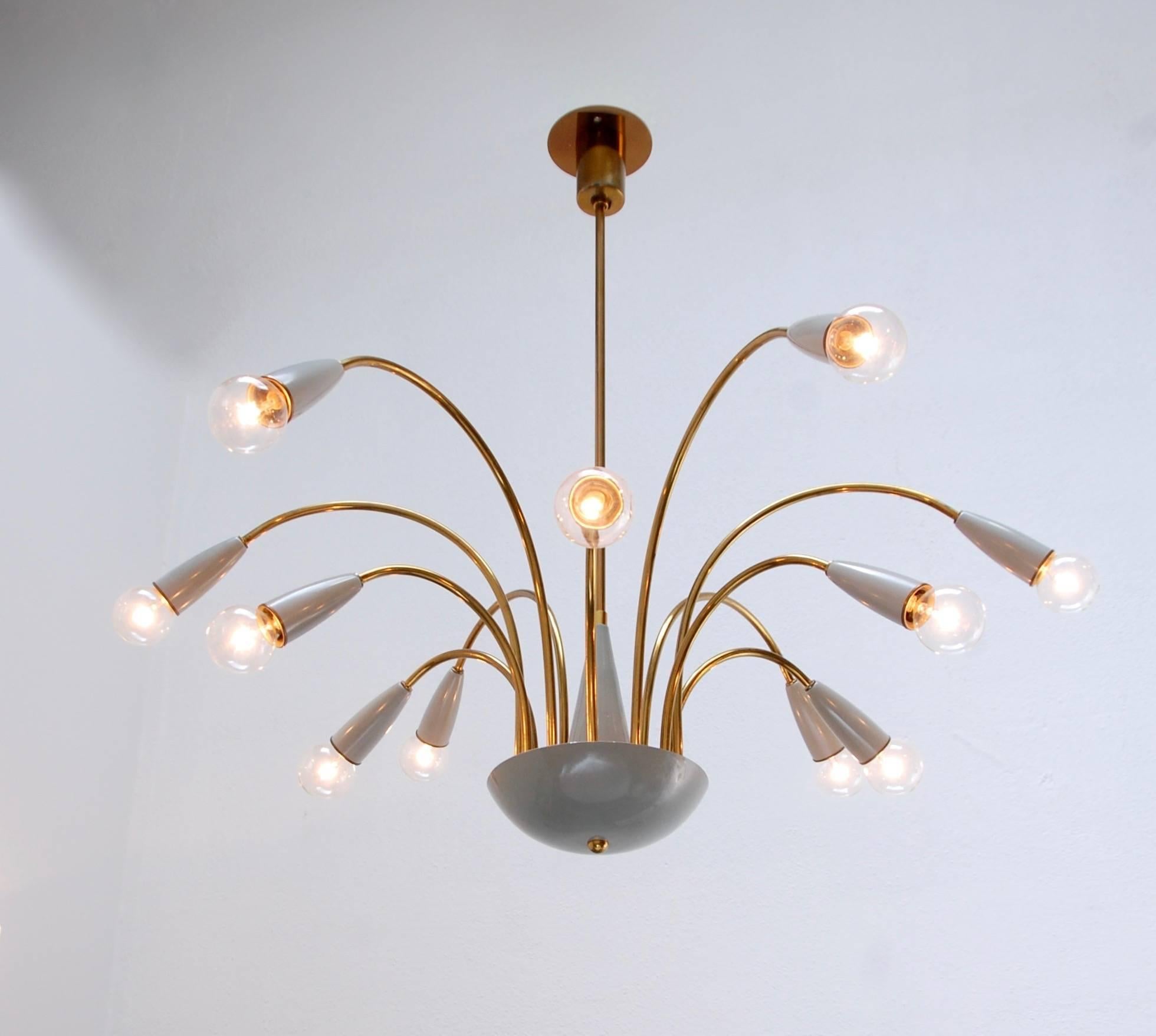 1960s botanical chandelier from Italy. Fixture has original paint and finish. The canopy has been modified for American j-box connection. E12 candelabra based light bulbs. Rewired for use in the US.
Drop: 28”.
Fixture height: 12”.
Diameter: 31”