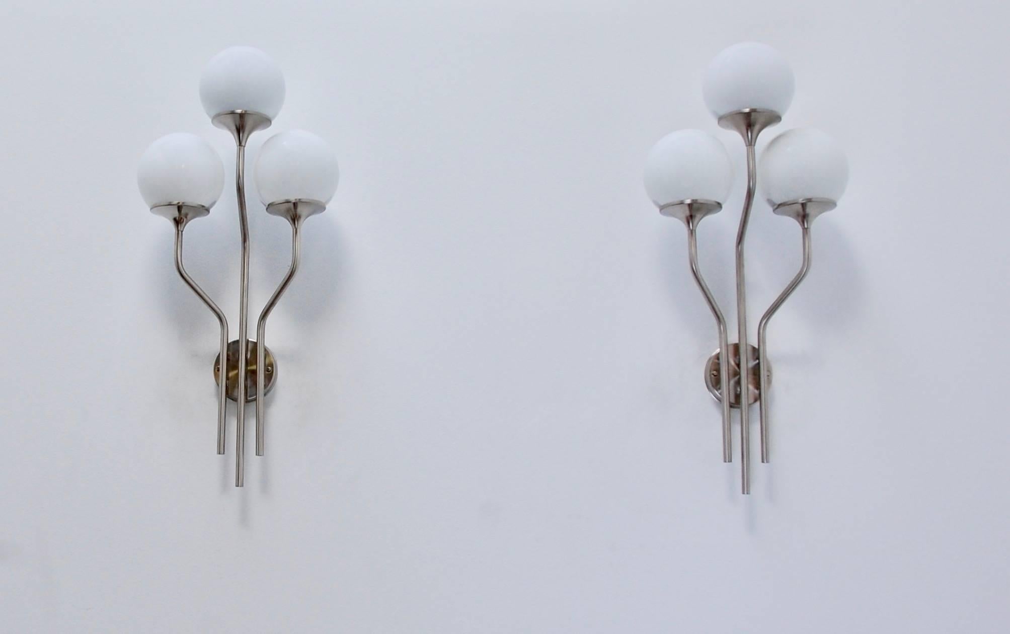 (1) Statuesque satin nickel large Lamperti sconce from Italy. Fully restored, and rewired and ready for use in the US. We can rewire for use anywhere in the world. Currently has three E12 candelabra based sockets per globe shade. 120 watts max per