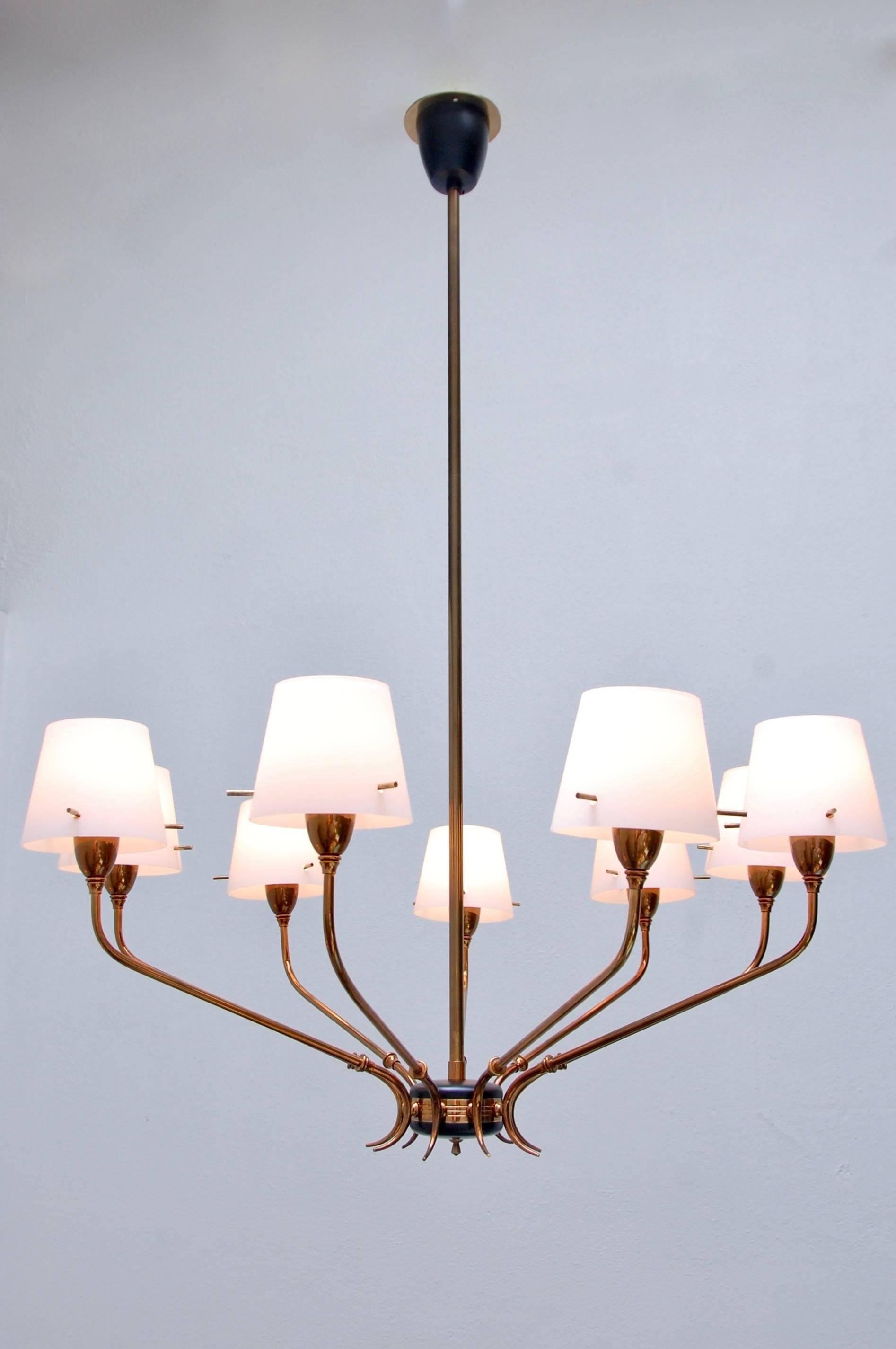 Of the period Italian chandelier with nine arms from the early 1950s. Fully restored, original glass shades, E12 candelabra based sockets, wired for the US. Drop adjustable upon request.
We at Lumfardo Luminaires do all the restorations of our