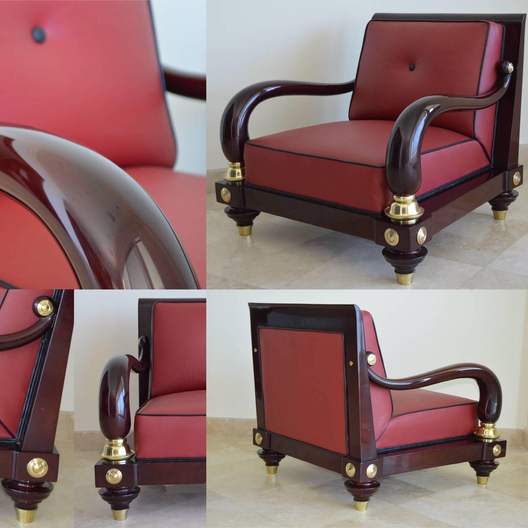Beautiful lacquered mahogany and leather lounge chairs.
By Octavio Vidales.
For Muebles Johrvy, Mexico.
Mexico City, circa 1950s.

(Very rare set of two chairs.)

Heavy and solid brass accents and sabots.

.