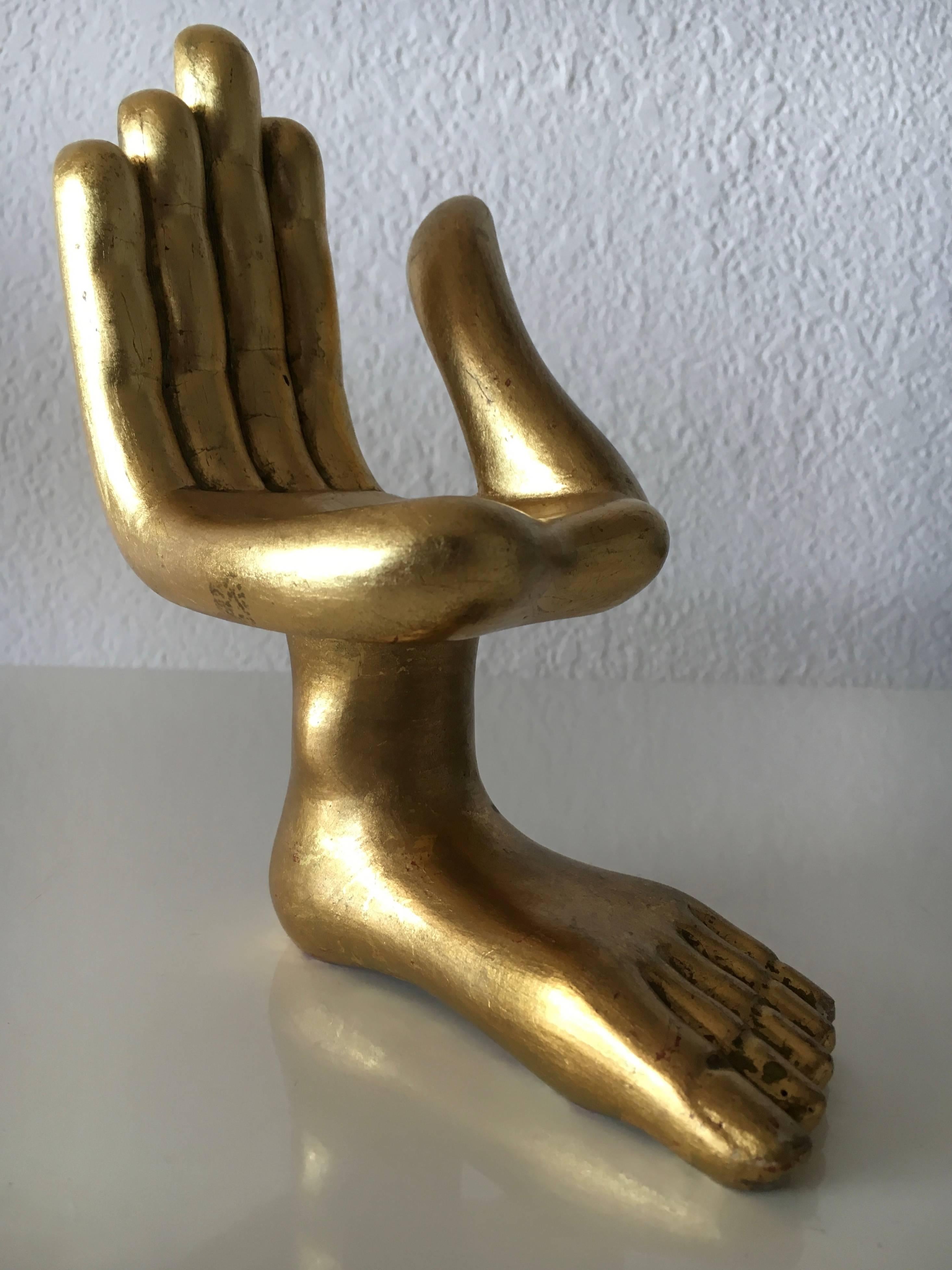 Rare early-miniature of the iconic hand-foot chair in mahogany and gold leaf.
by Pedro Friedeberg.
Mexico City, circa 1960s.
Signed by the Artist. 
 