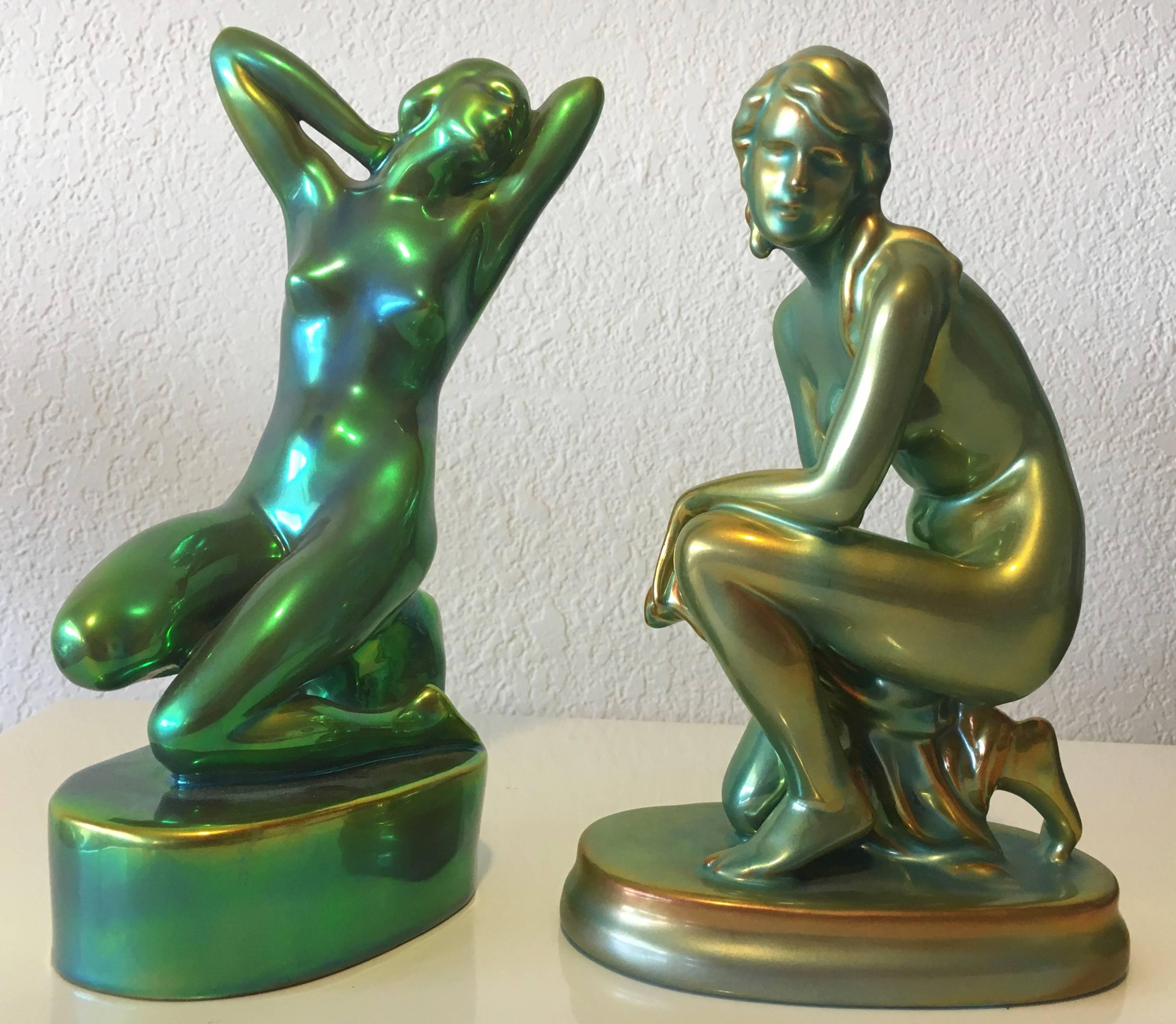 Decorative and hard to find Zsolnay pottery green gold pair of nude females figurines in very good vintage condition. 
Bottom marked with Zsolnay Logo and Made in Hungary.
Measures: Tall Nude:
6' inch D.
4