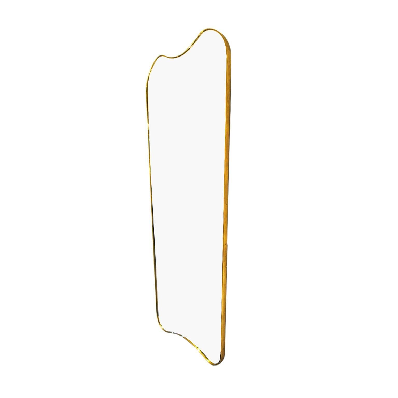 Wall Mirror model F.A. 33 desgined by Gio Ponti, with structure made in wood and frame made in tube of brass.