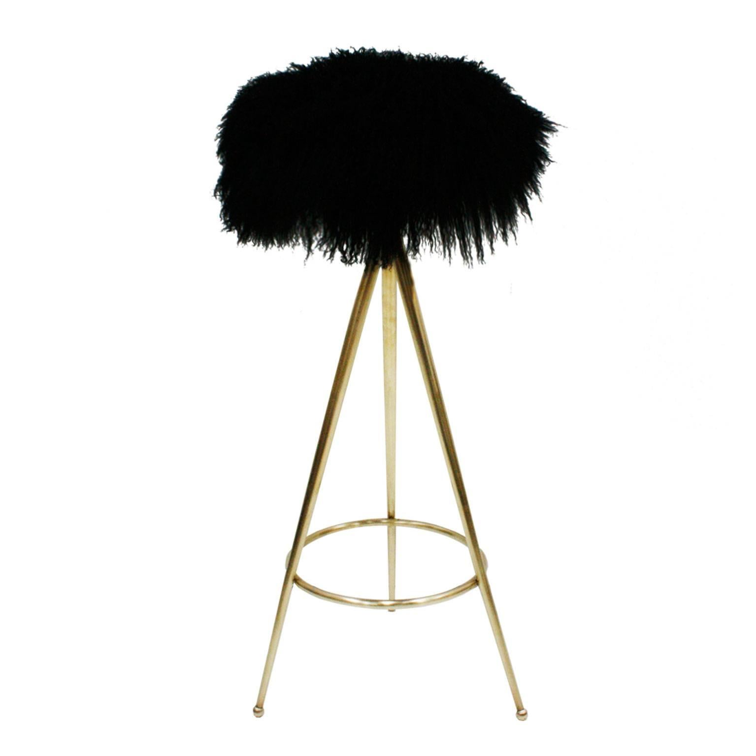 Pair of stools designed by Gio Ponti, upholstered in natural Mongolian goat fur.