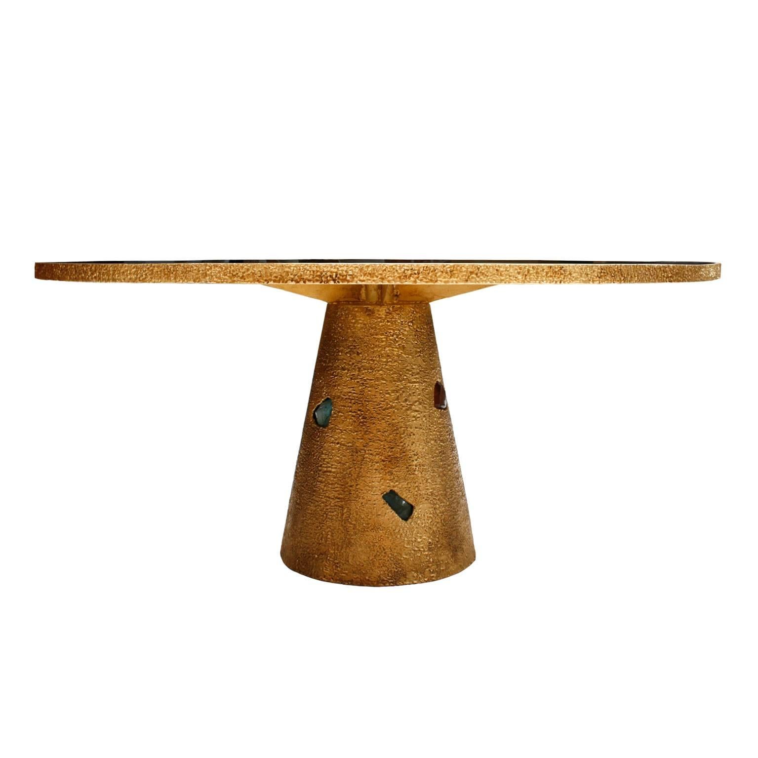 Dining table made in brass and bronze structure and glass on top. This table is realized of handcrafted form, with embedded Murano glass pieces.
 