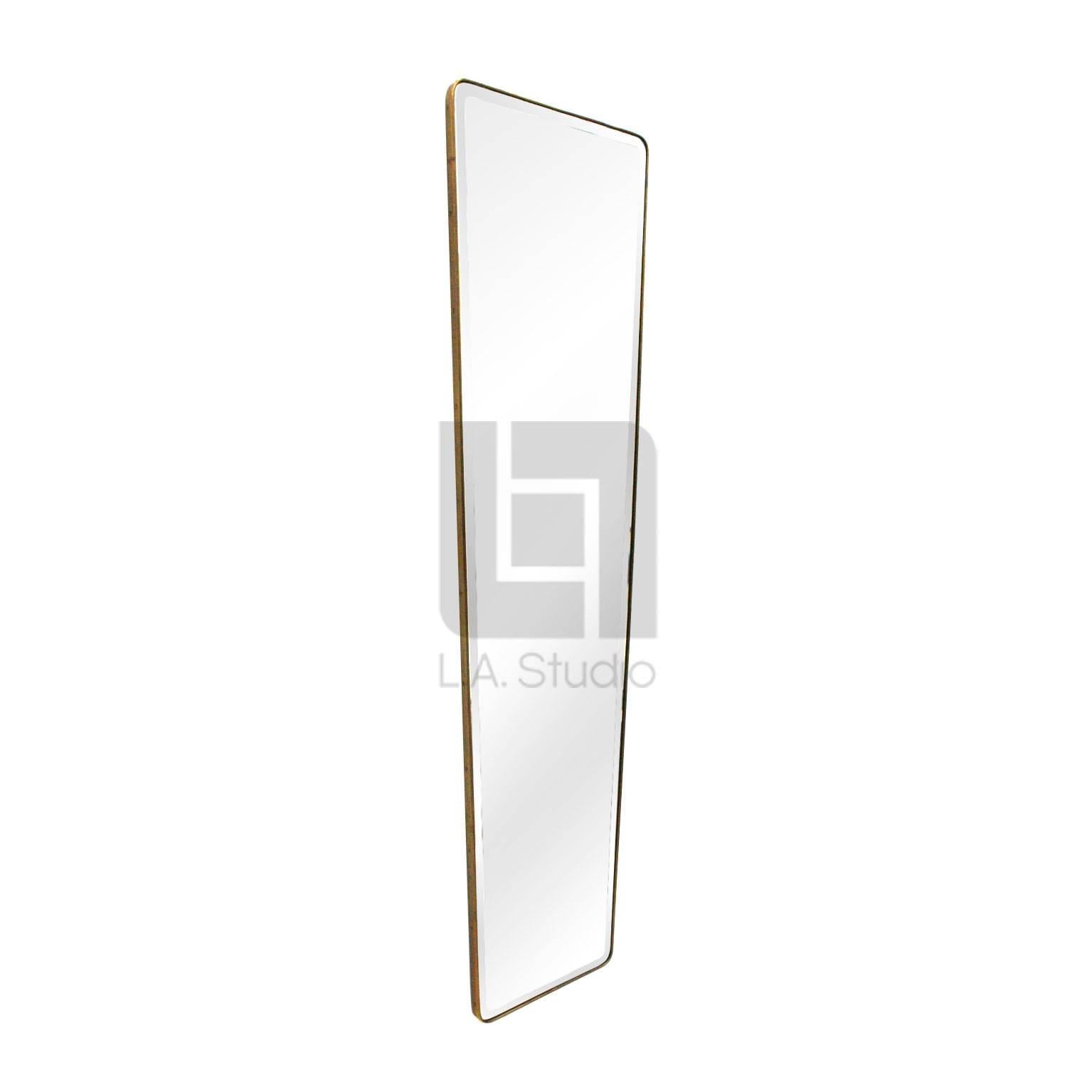 Set of three mirrors attributed to Gio Ponti with brass profiles. The mirrored glass it's original of the period.