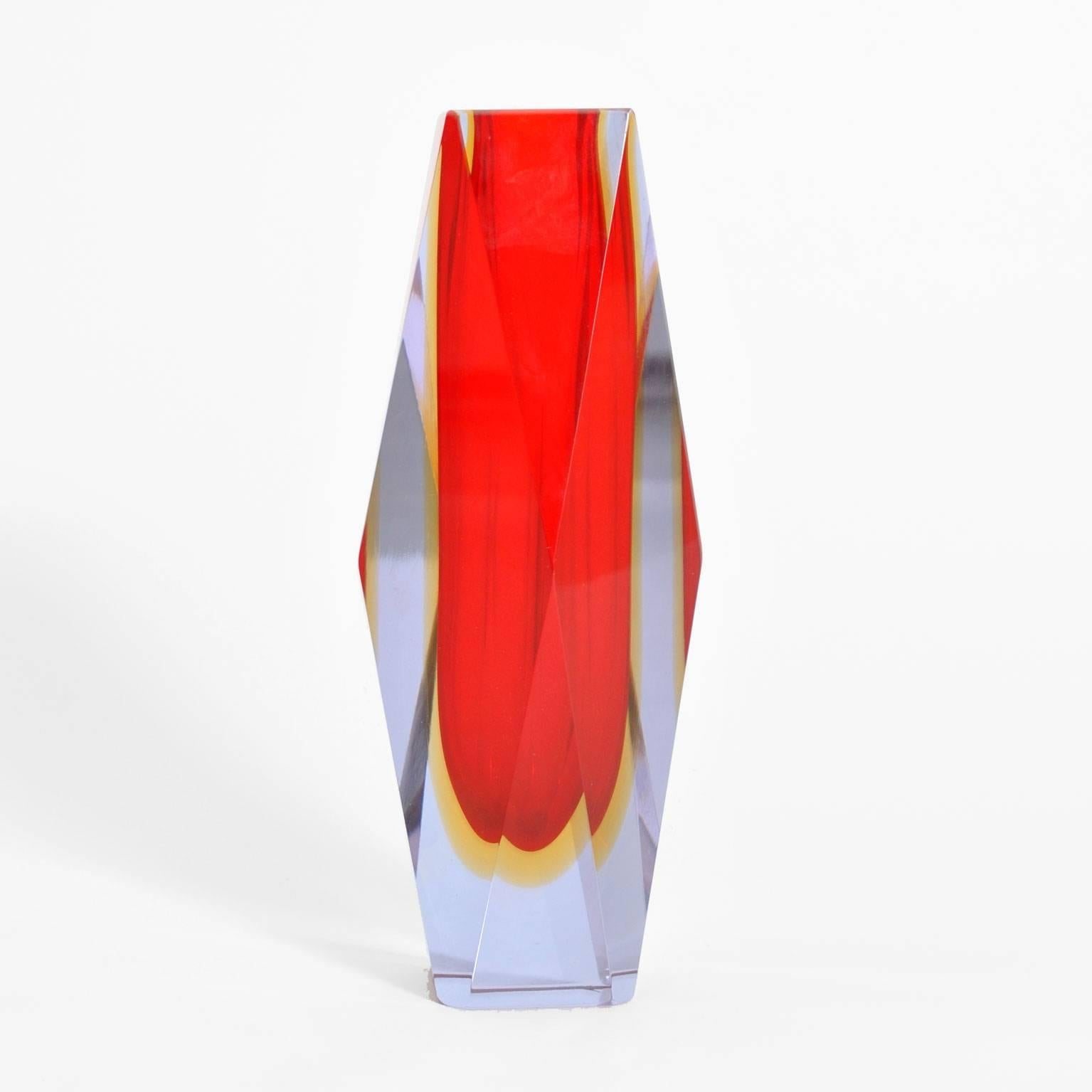 Set of four vases designed by Flavio Poli made in Murano glass carved and molded by hand in red.