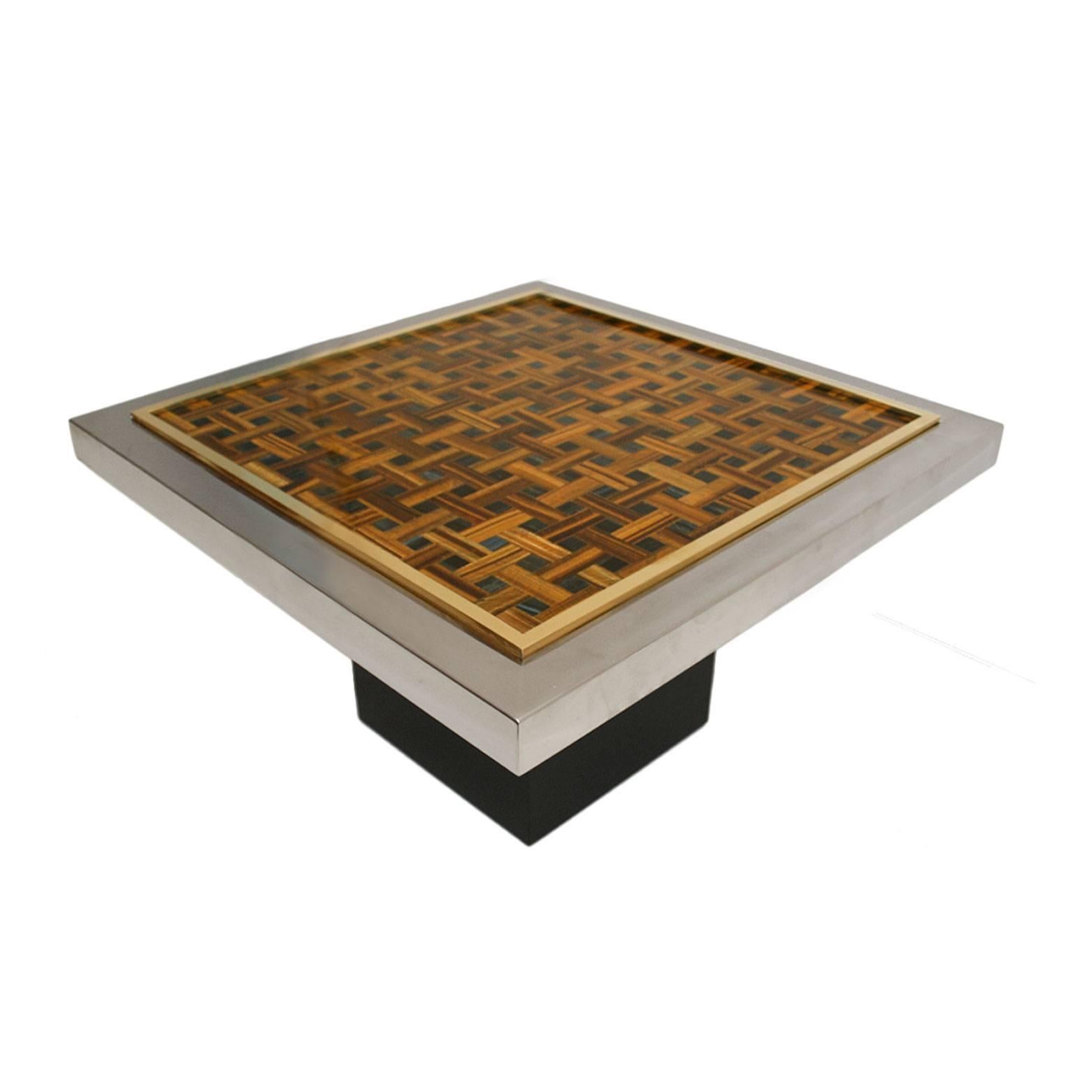 Side table with structure made of steel and brass, metal base lacquered in black and tap with natural stone marquetry of golden and blue tiger eye.