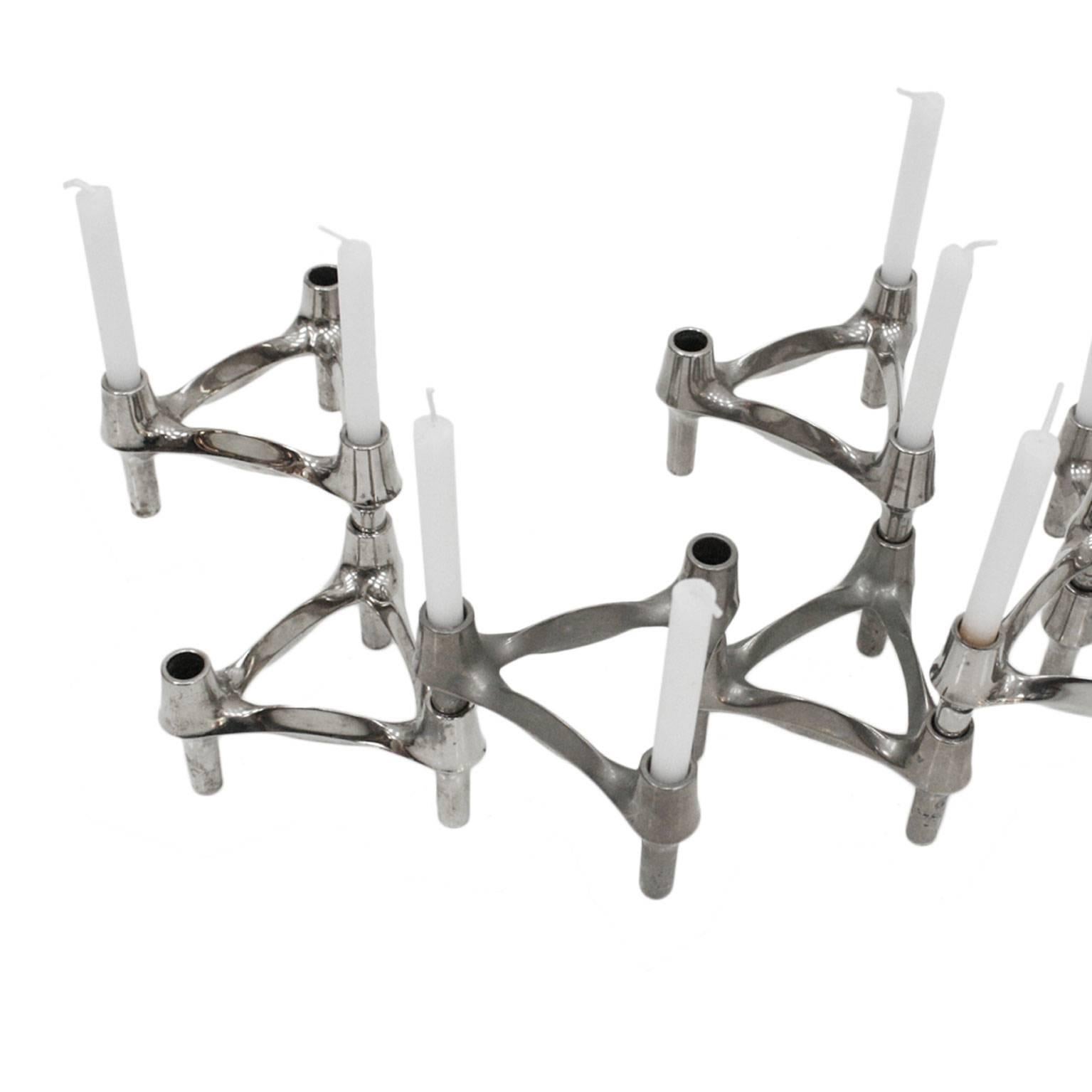 Set of twenty pieces of candelabras designed by Caesar Stoffi. Made in steel with geometric shapes, Germany, 1950.