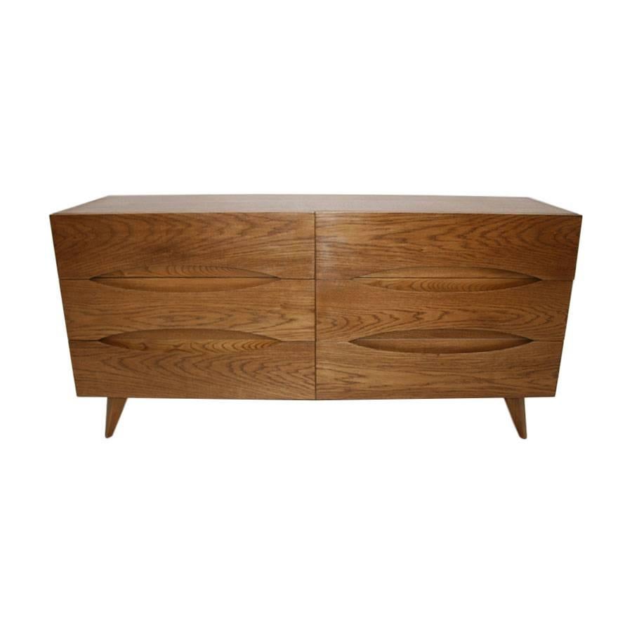 Italian sideboard made of walnut wood, composed of six drawers.