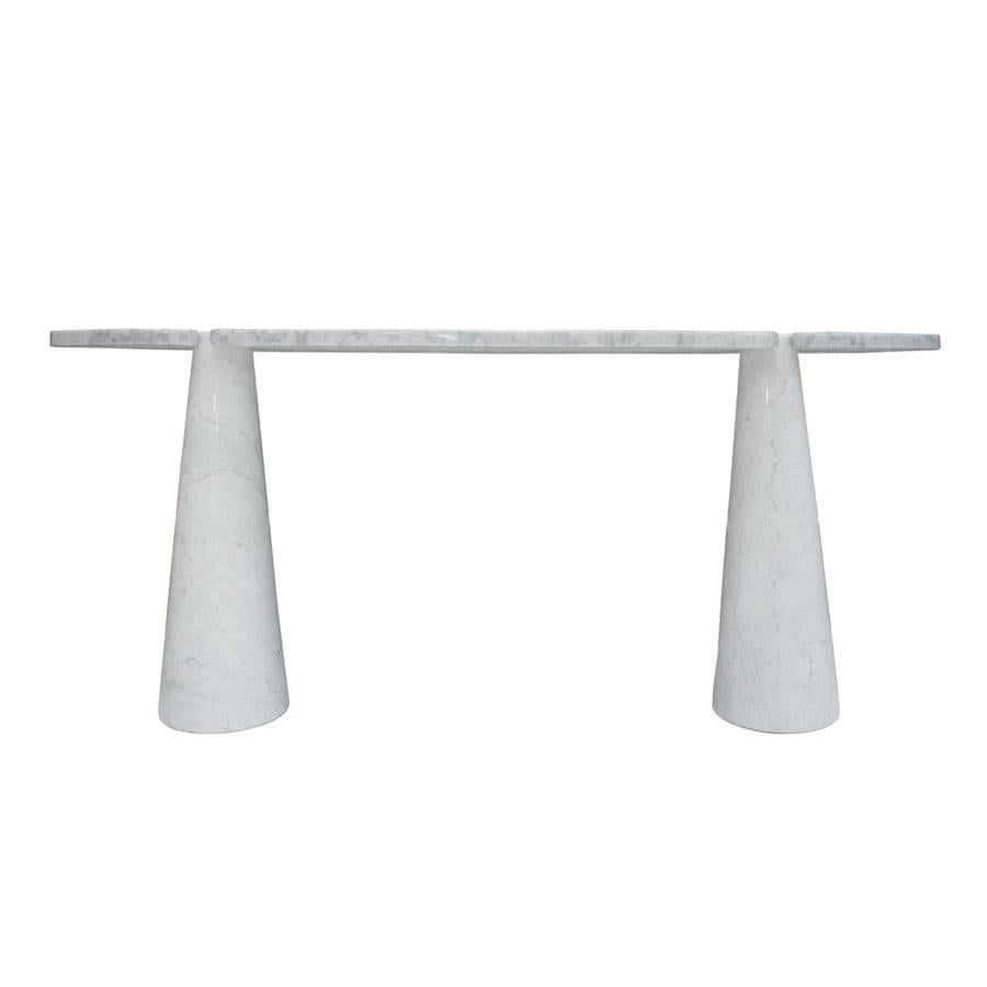 Console designed by Angelo Mangiarotti and edited by Skipper, composed of two conical trunk bases and made of Carrara marble.
